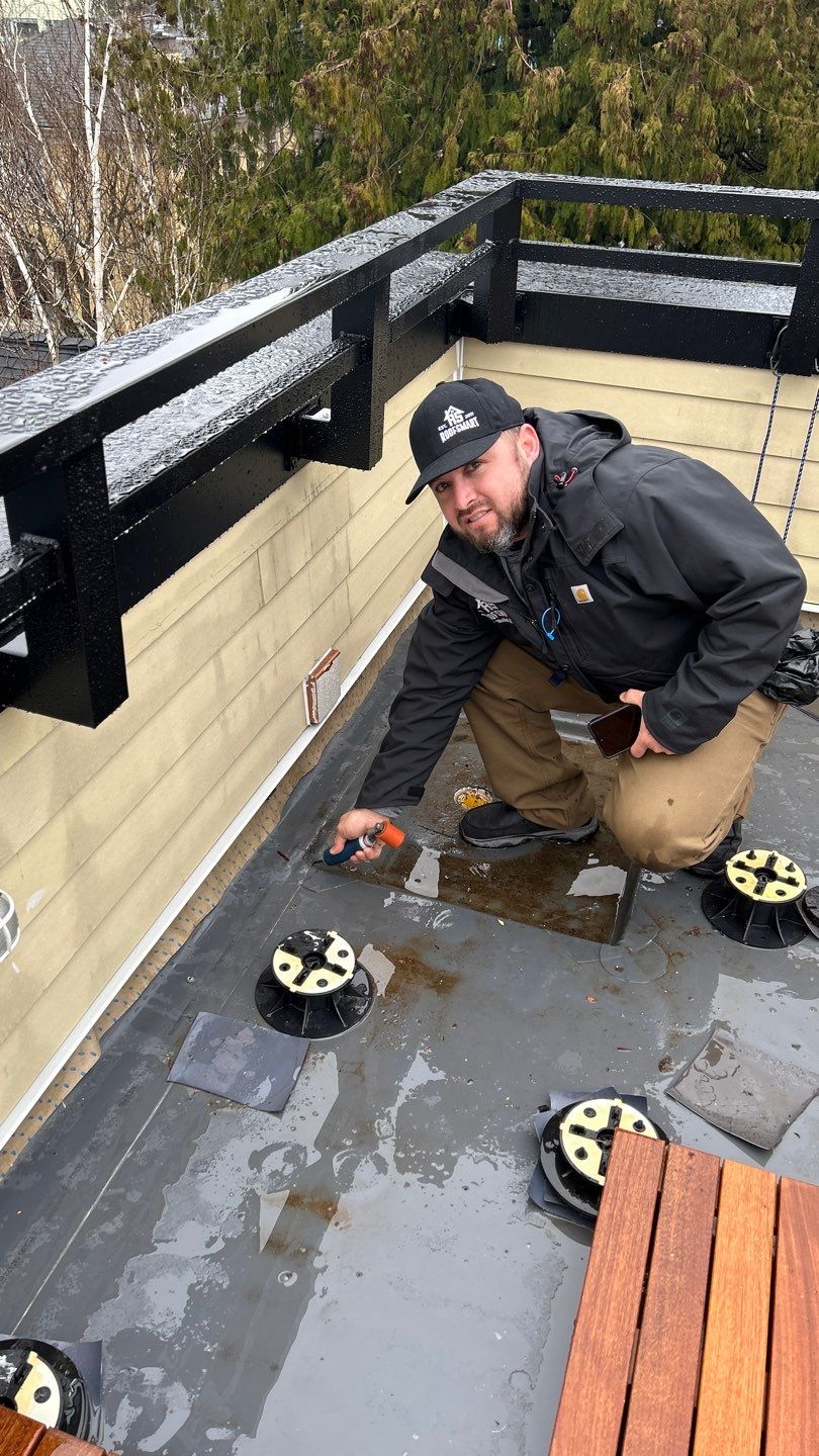 Seattle Queen Anne Rooftop Deck and Roof Replacement using Standing Seam Metal - Black by RoofSmart