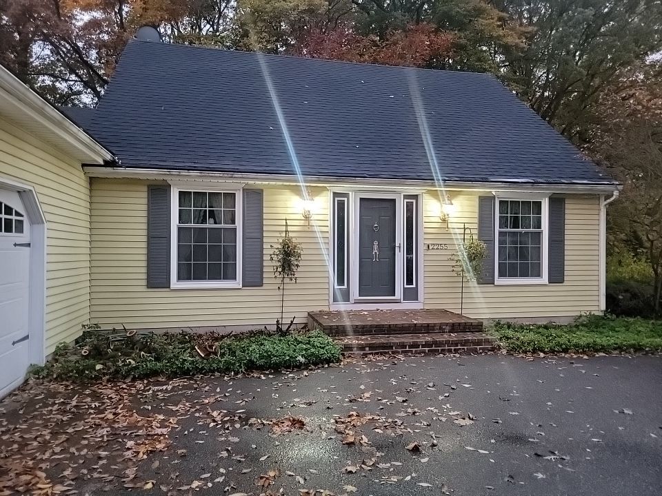 Porch Roof Addition by Avalon Roofing and Exteriors
