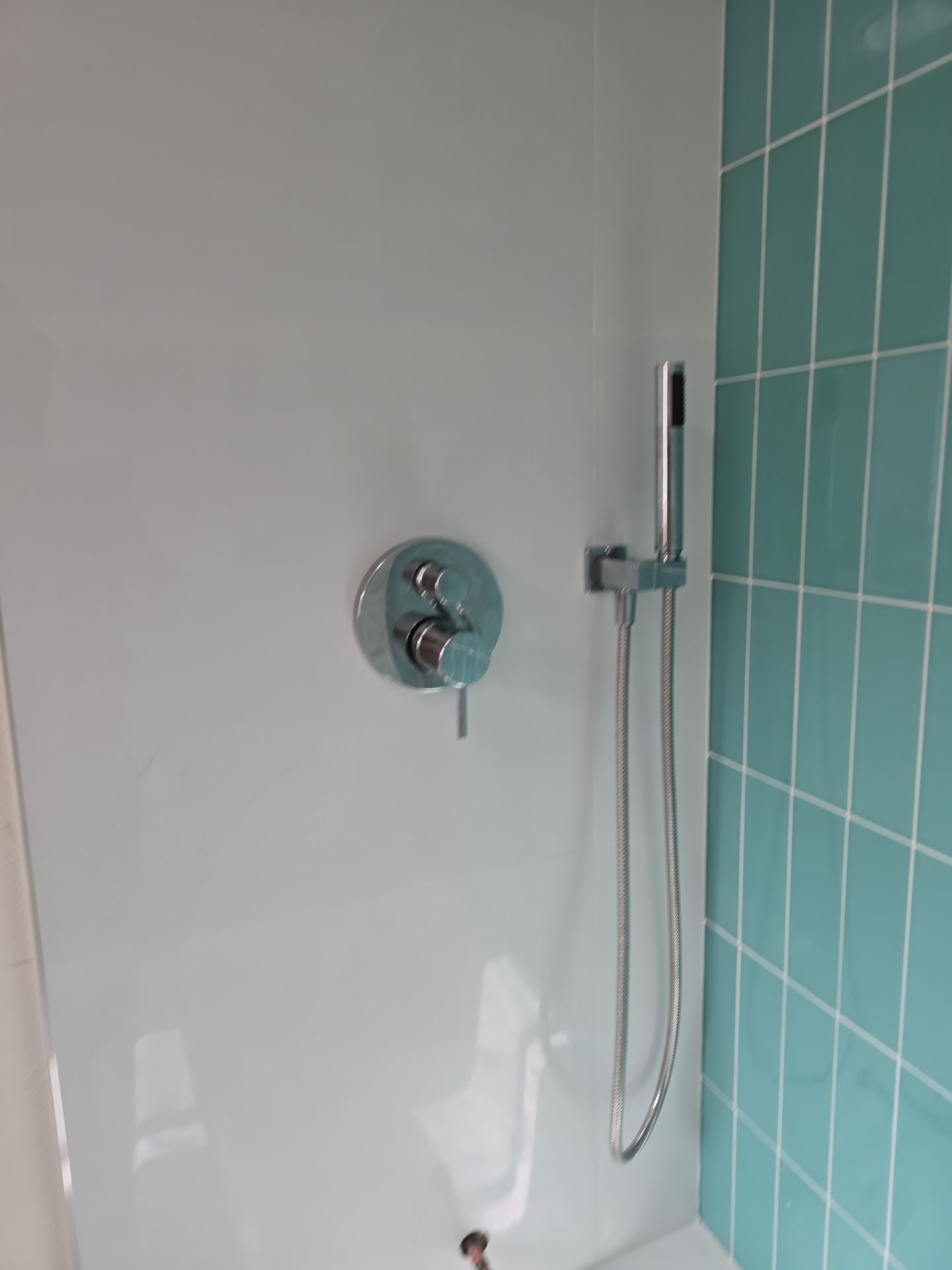 Scope of Work: Installation of Shower, Toilet, Sink, Fixtures, Pipes, and Seals by Us Plumbing
