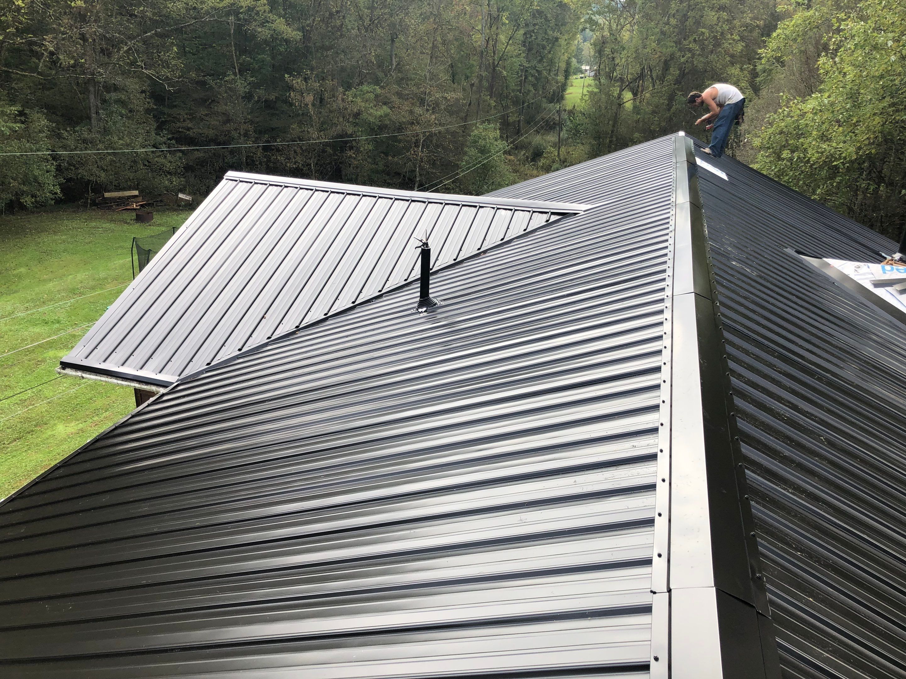 Metal Roof and Vinyl Siding, Soffit, Gutters using LifeTite Premium metal roofing  by Secure Construction Company Inc
