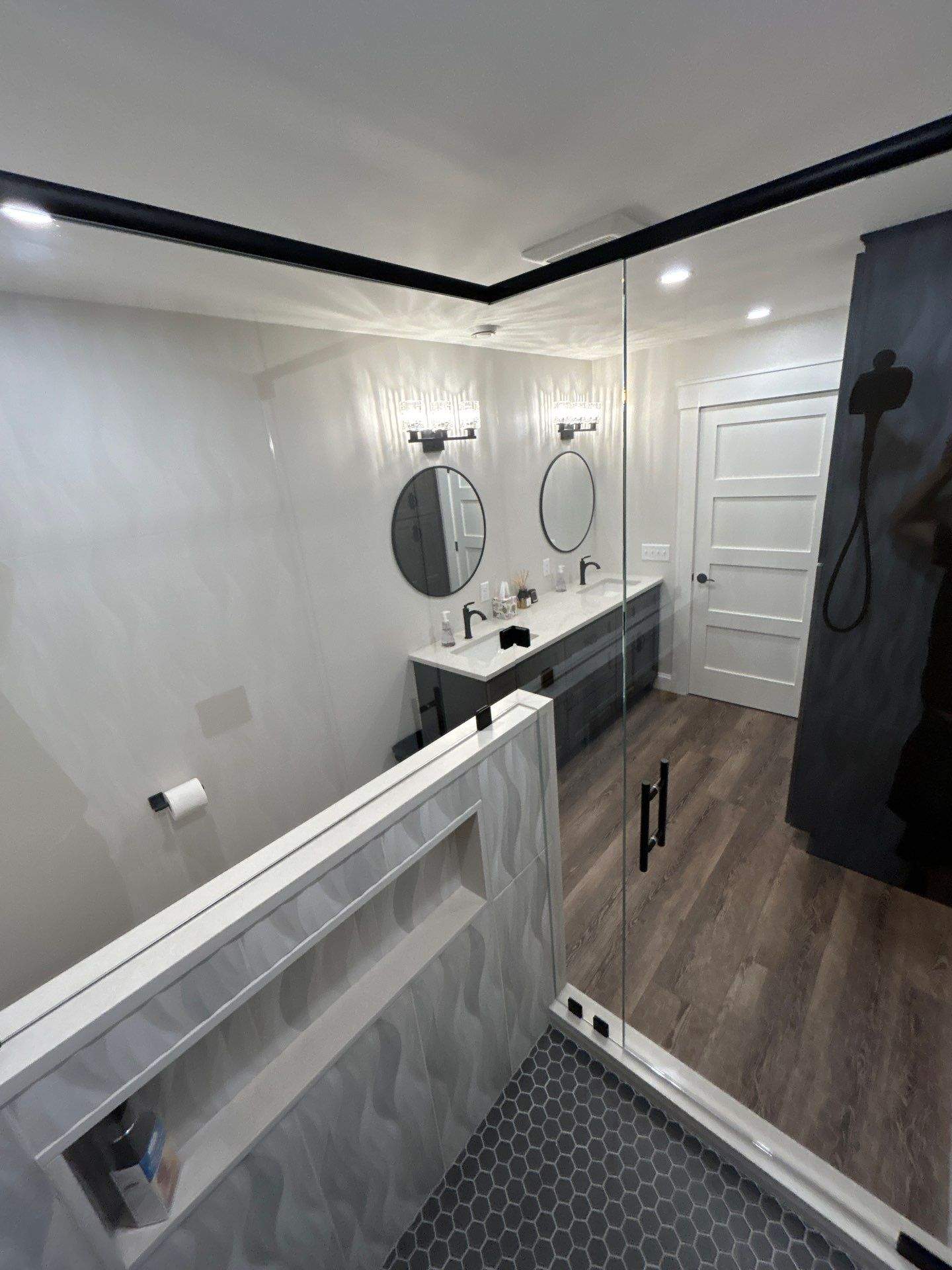 Frameless Shower Enclosure w/Header Bar by Cheshire Glass Company
