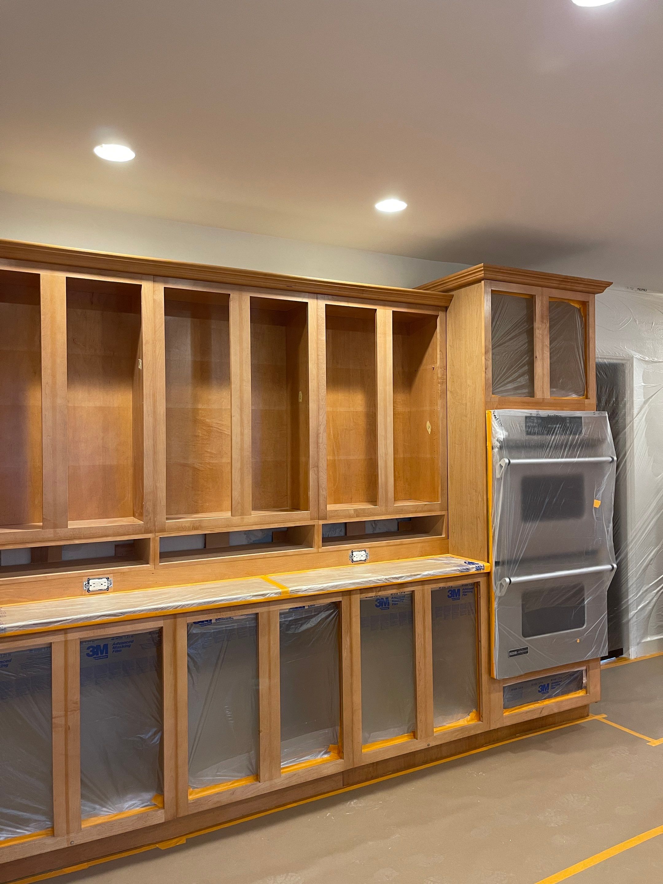 Kitchen Cabinet Painting using Milesi 2k by Trendy Walls Inc.