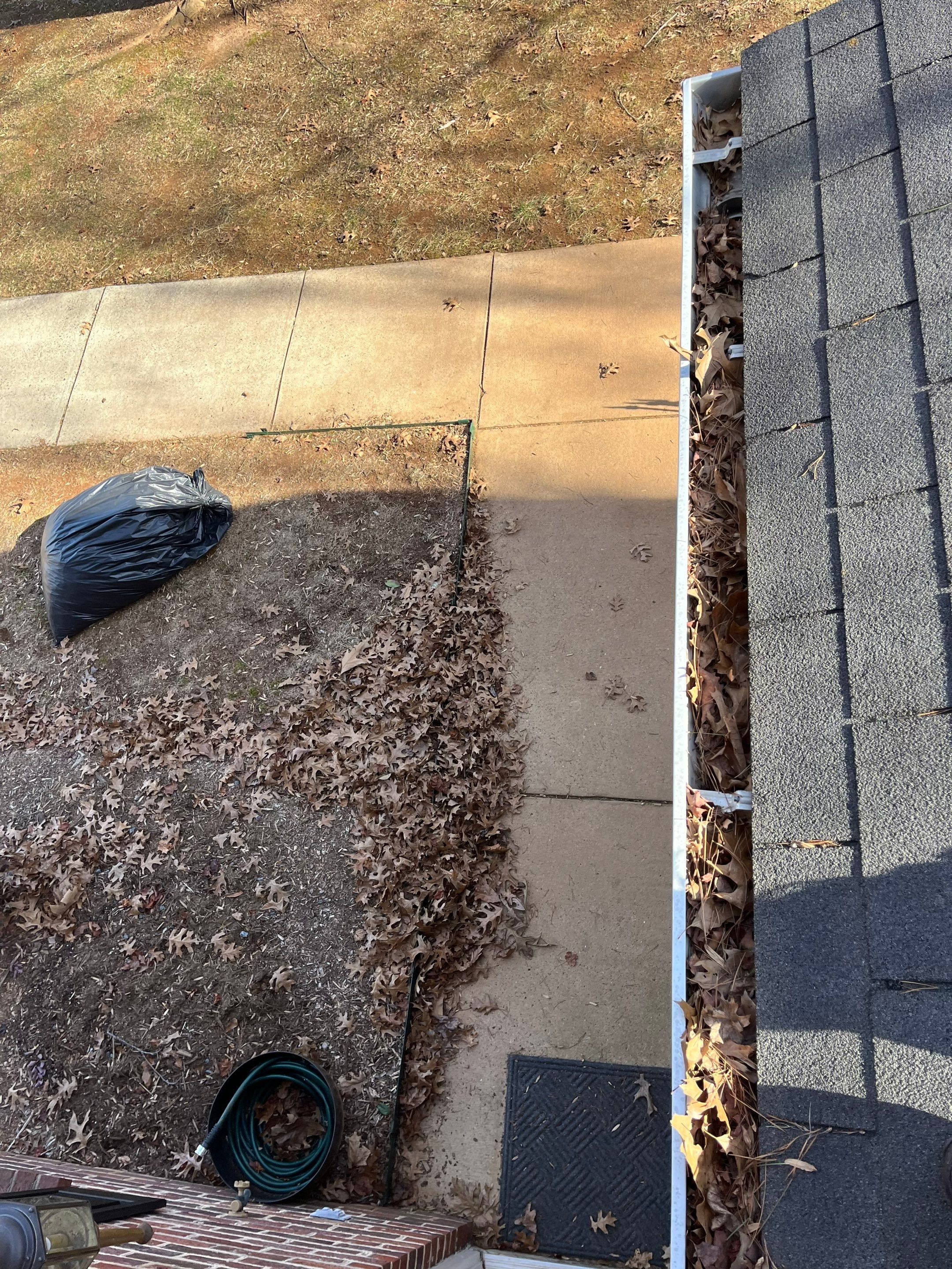 Commercial gutter cleaning Hickory & Statesville, NC before photo with filled gutters
