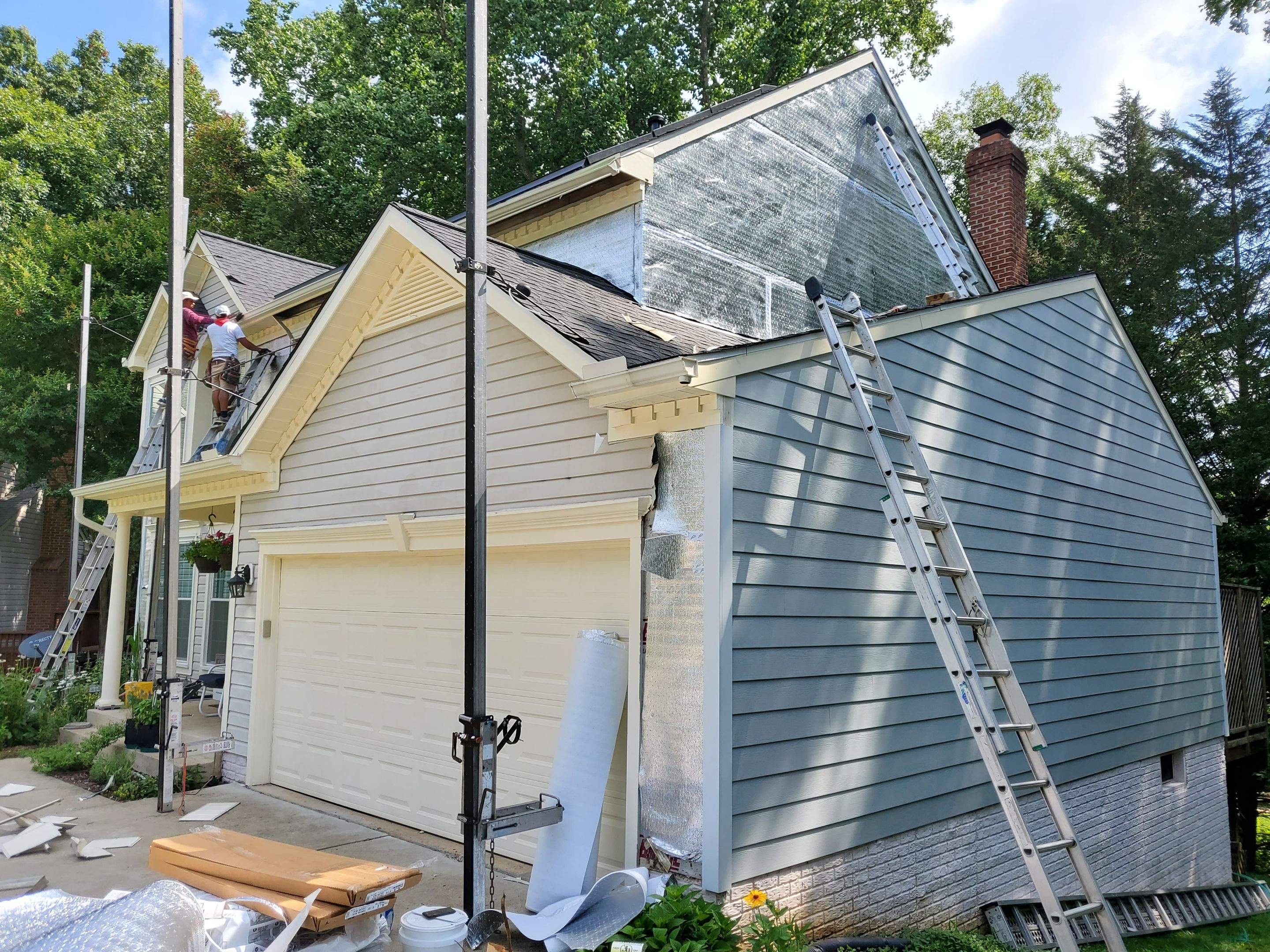 Exterior Home Makeover using GAF Timberline HDZ, GAF Decotech, and James Hardie Siding by American Home Contractors