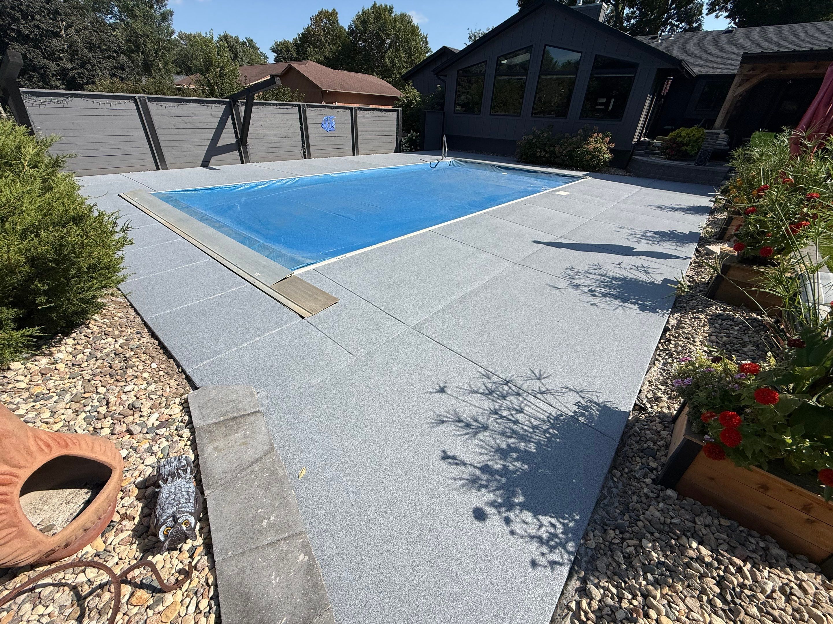 Garage Floor and Textured Pool Deck Coating in Sioux Falls by Select Painting, Coatings & Garage Cabinets