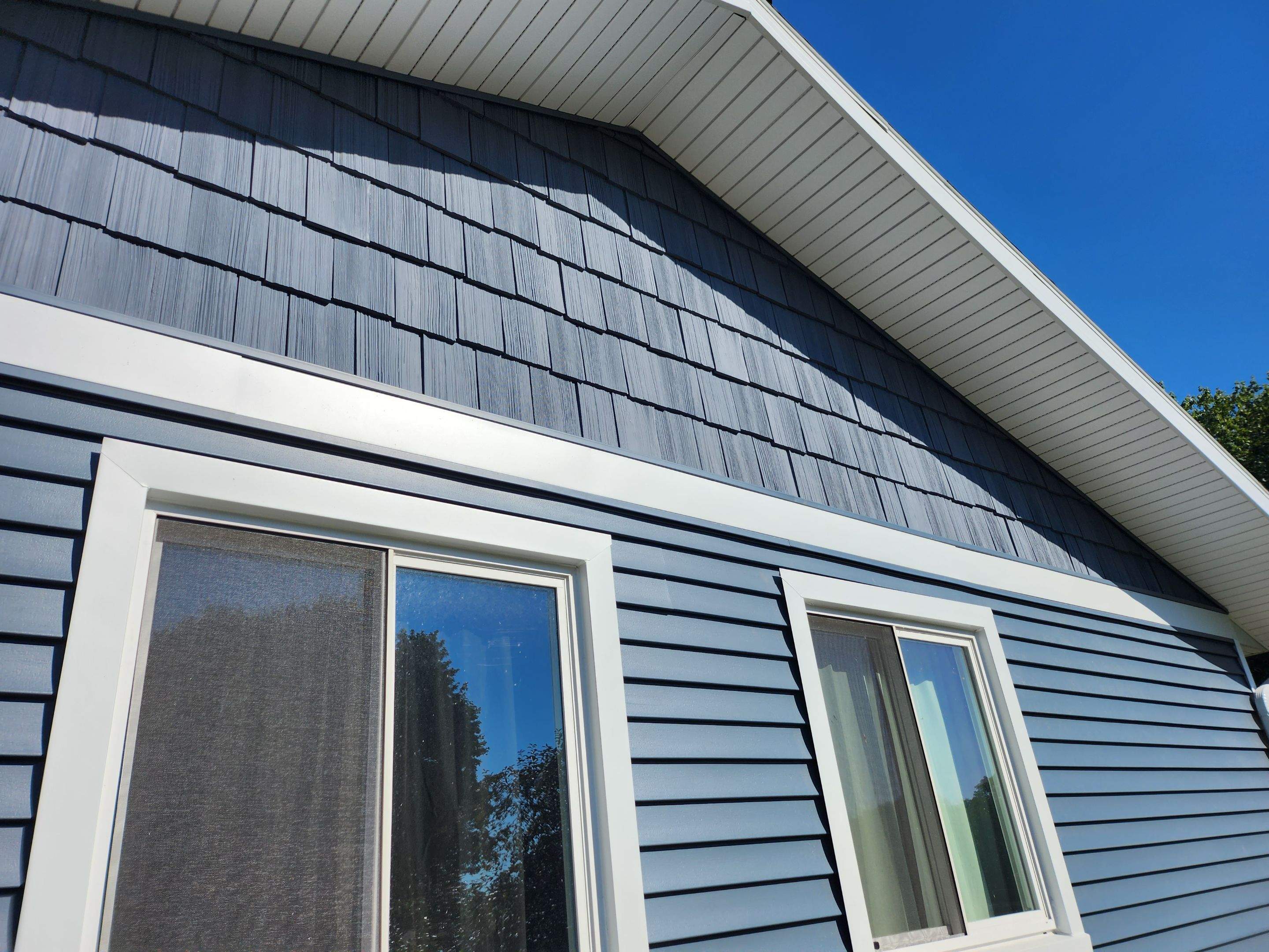 We gave this house a huge make over! by Energy Plus Home Improvements