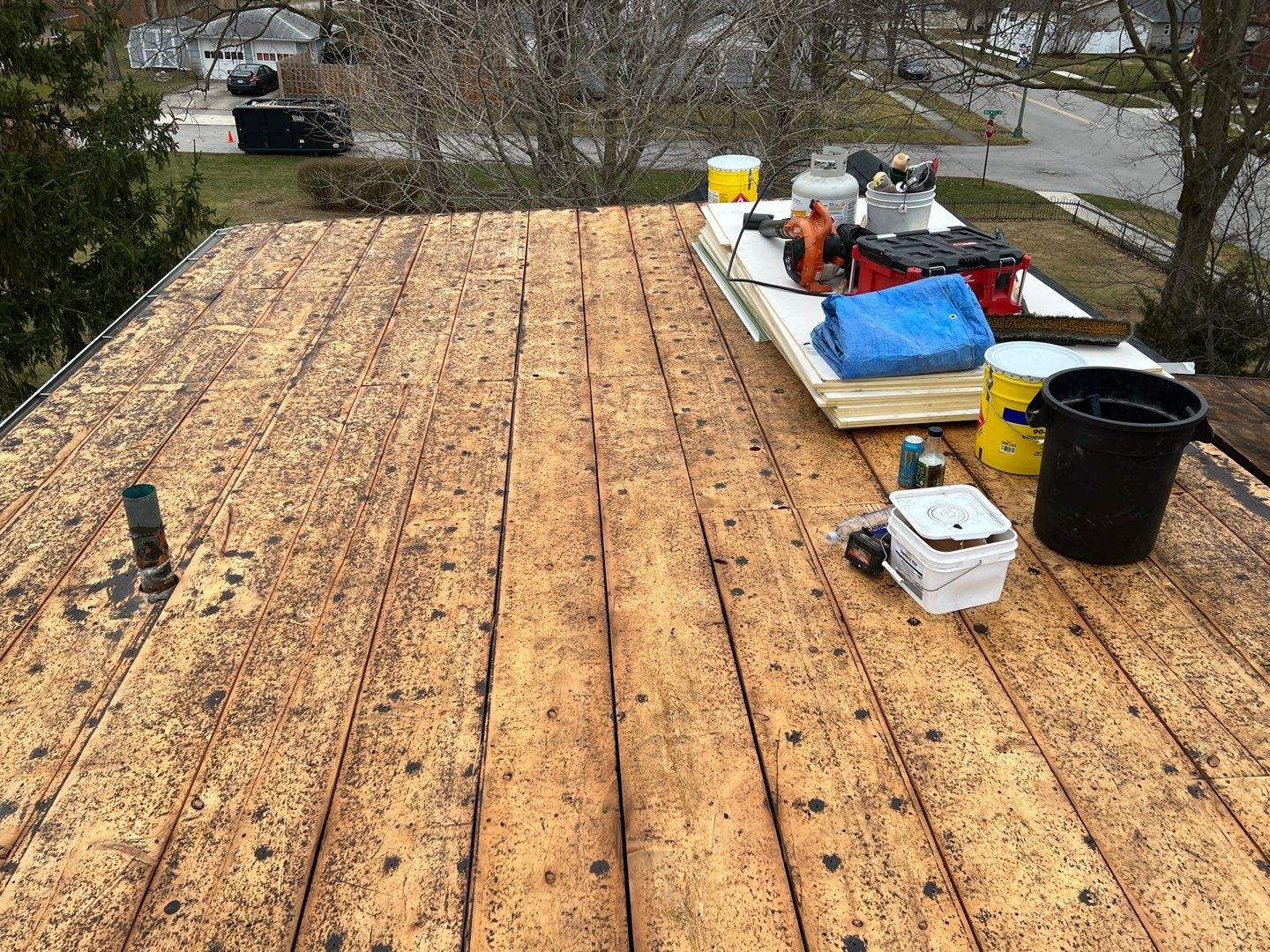 Residential Roofing Installation using 60 mil rubber roof by Nitro Roofing and Construction