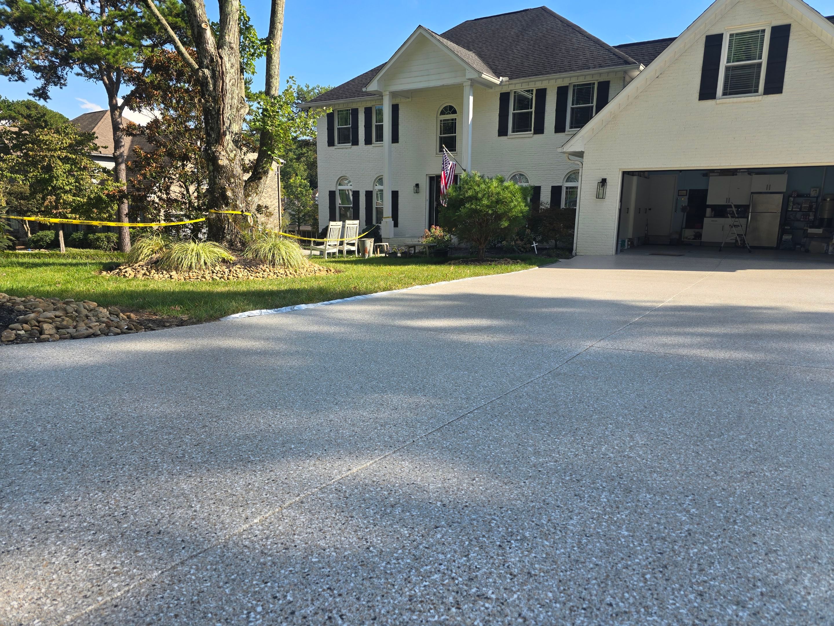 Driveway, Sidewalk, and Porch Using Claystone by Elite Floor Solutions