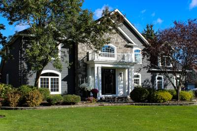 Exterior Renovations- Siding, Concrete, Railings, and Entry Door