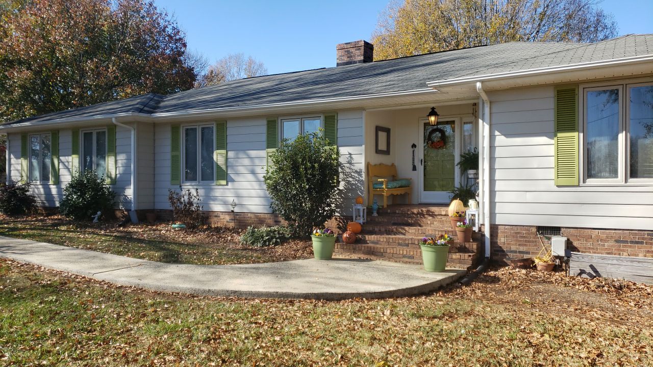 gutter cleaning and house wash and gutter guard installation by Power Wash Masters LLC