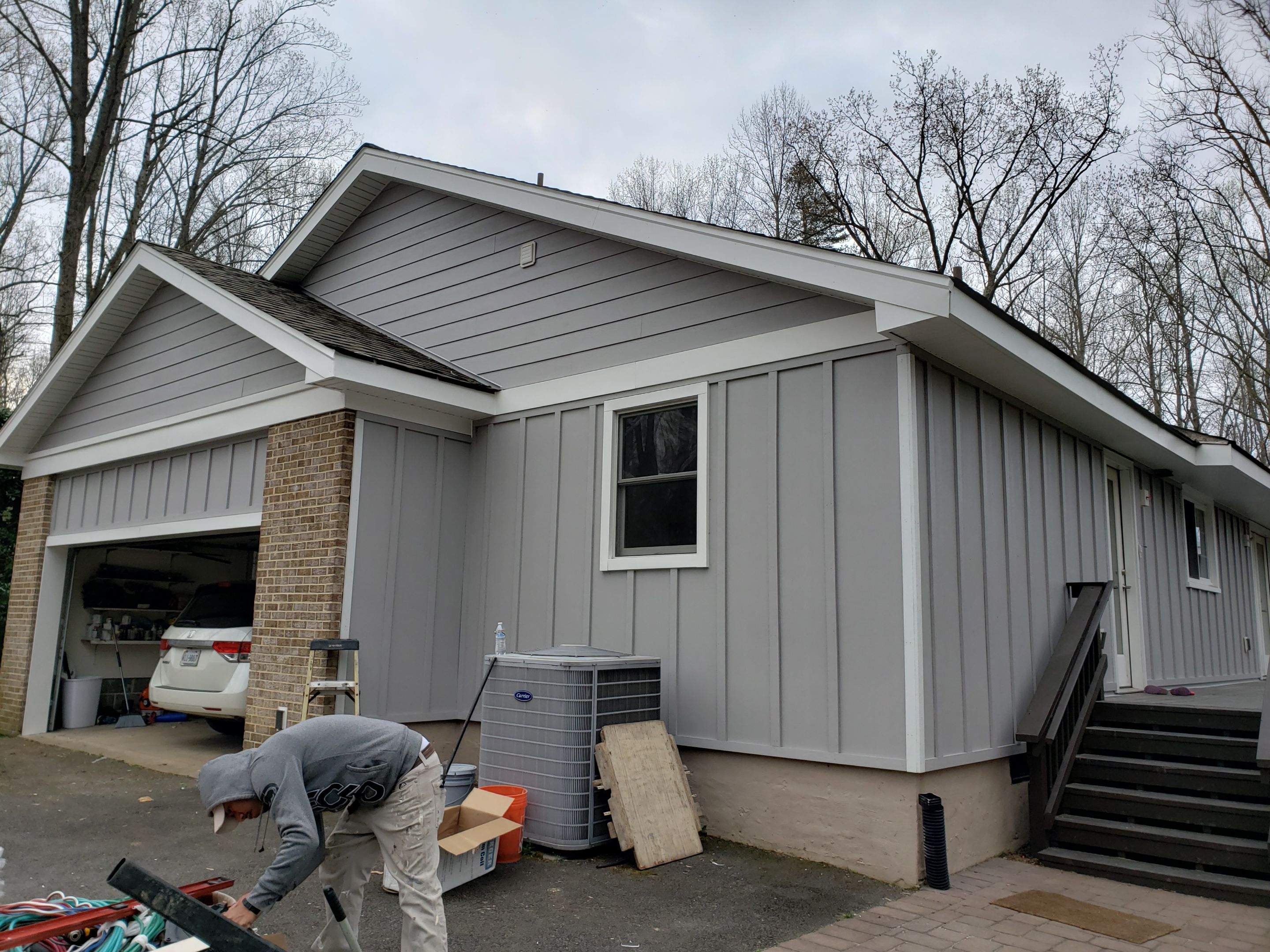 Roof, Siding, Door, and gutter replacement by American Home Contractors