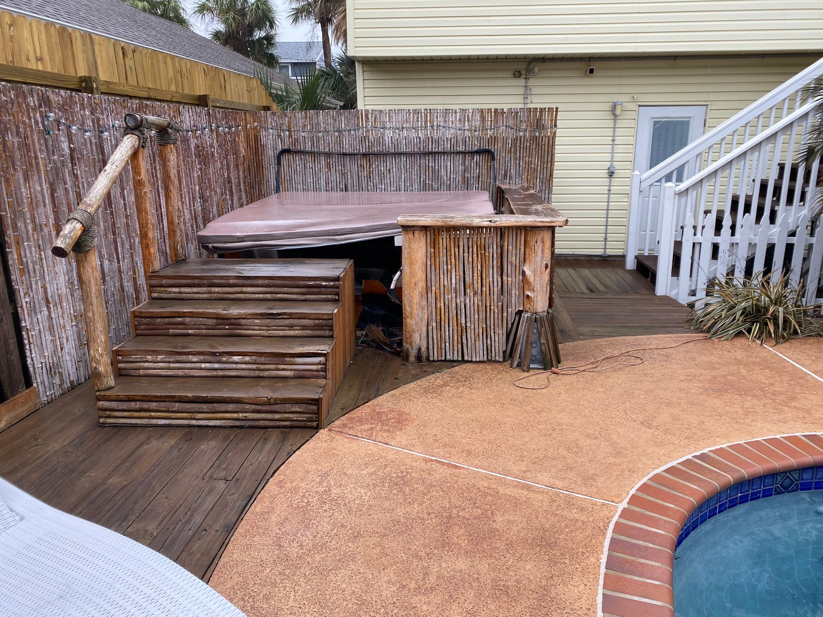 Poolside paradise by Bayfront Roofing and Construction