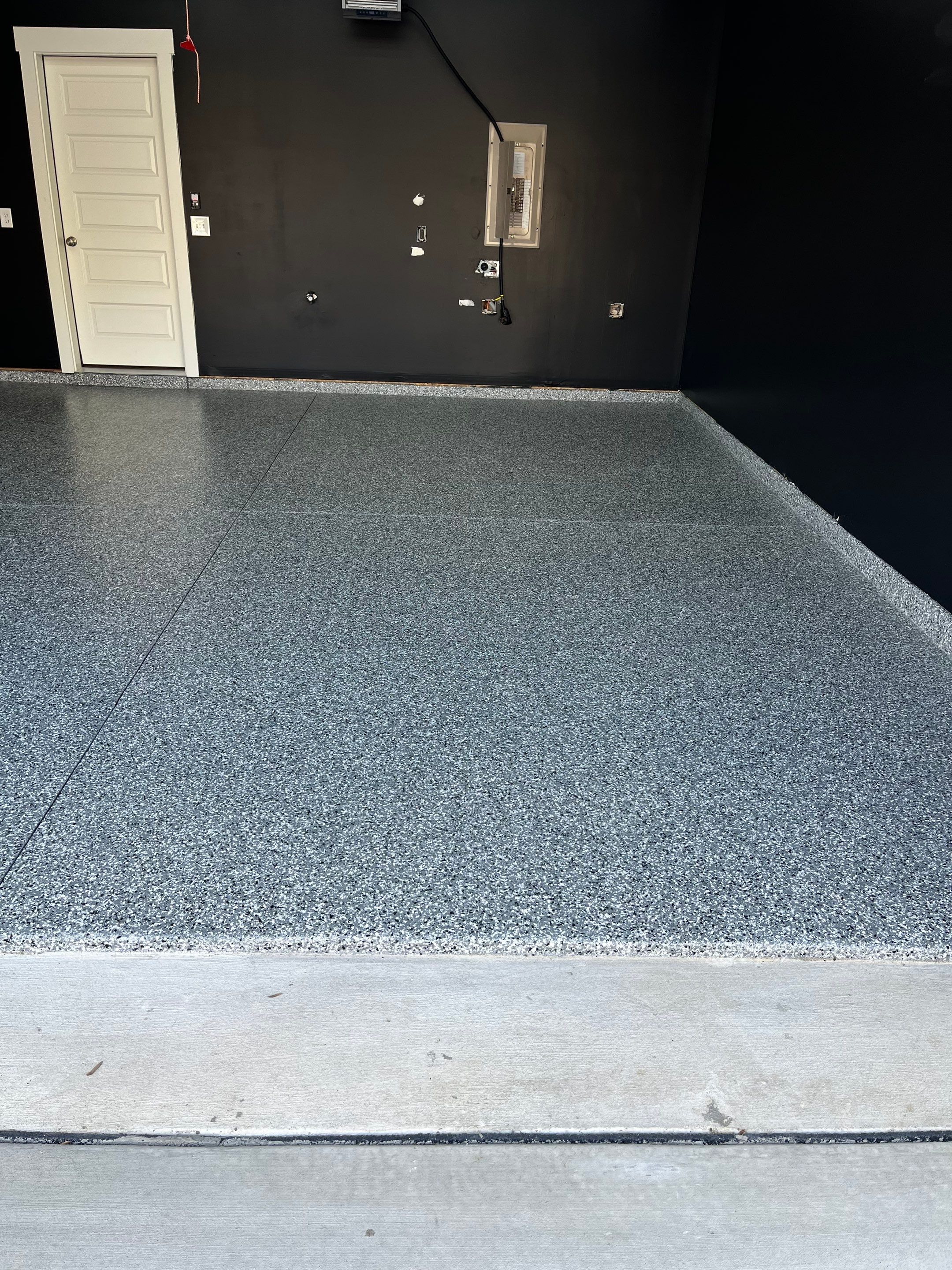 Garage Floor Coating using Wombat by My Garage Floor Guys