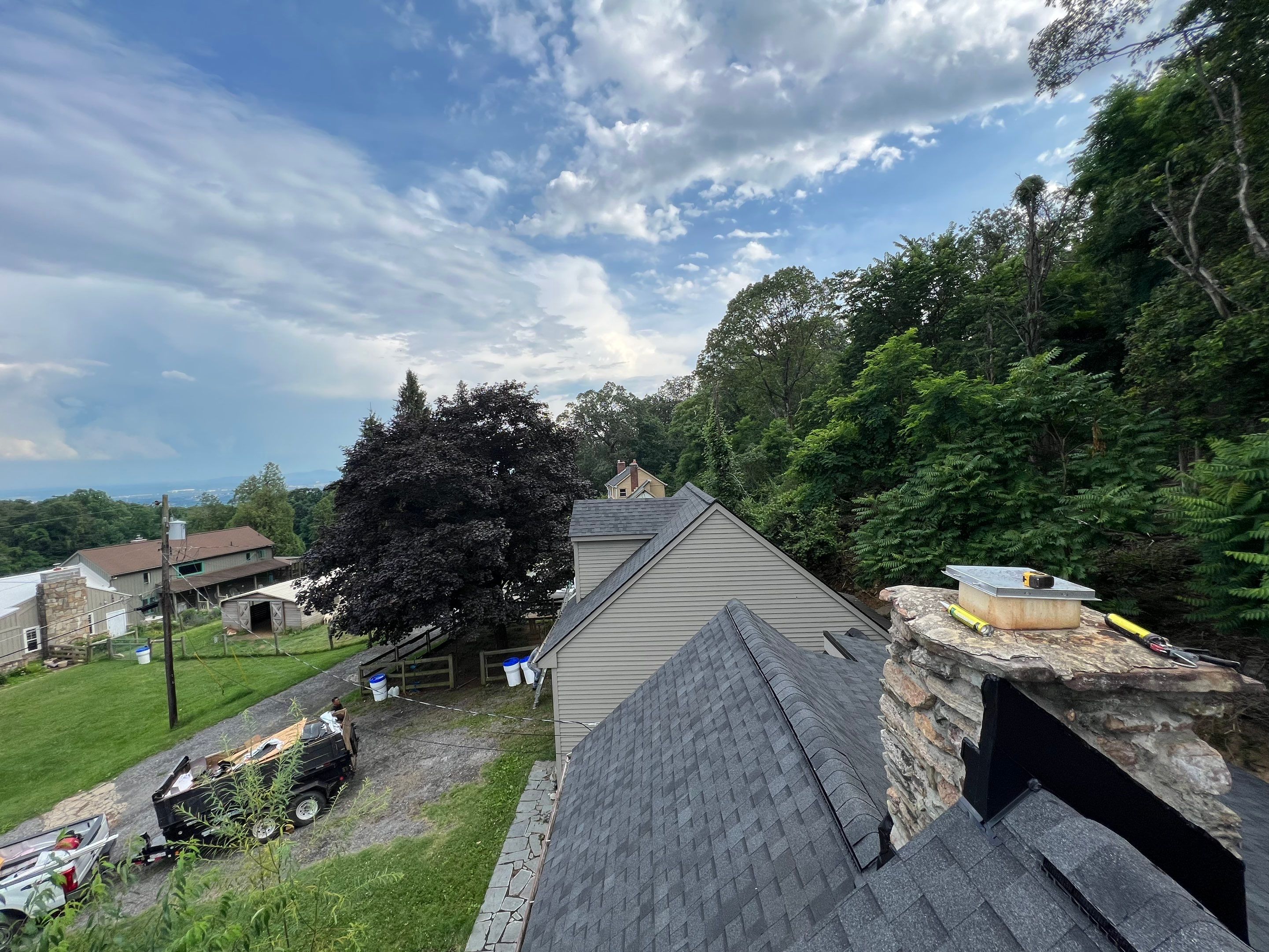 Residential Roofing Installation using Atlas Pinnacle Pristine Black Architectural Shingles by Frederick Roof Repair