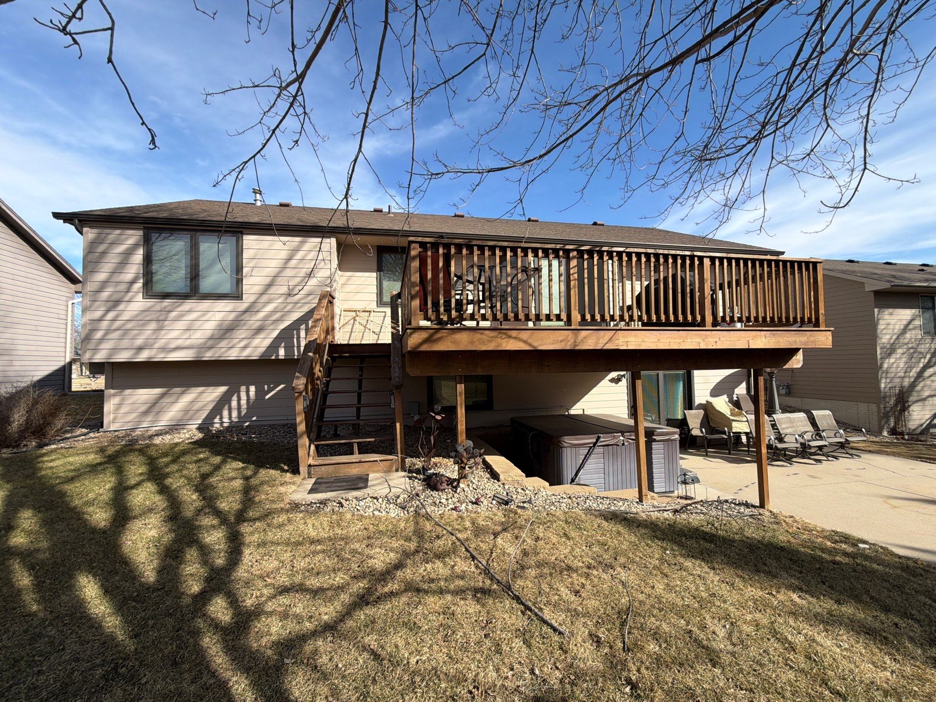 Residential Exterior Painting and Trim Restoration in Sioux Falls by Select Painting, Coatings & Garage Cabinets