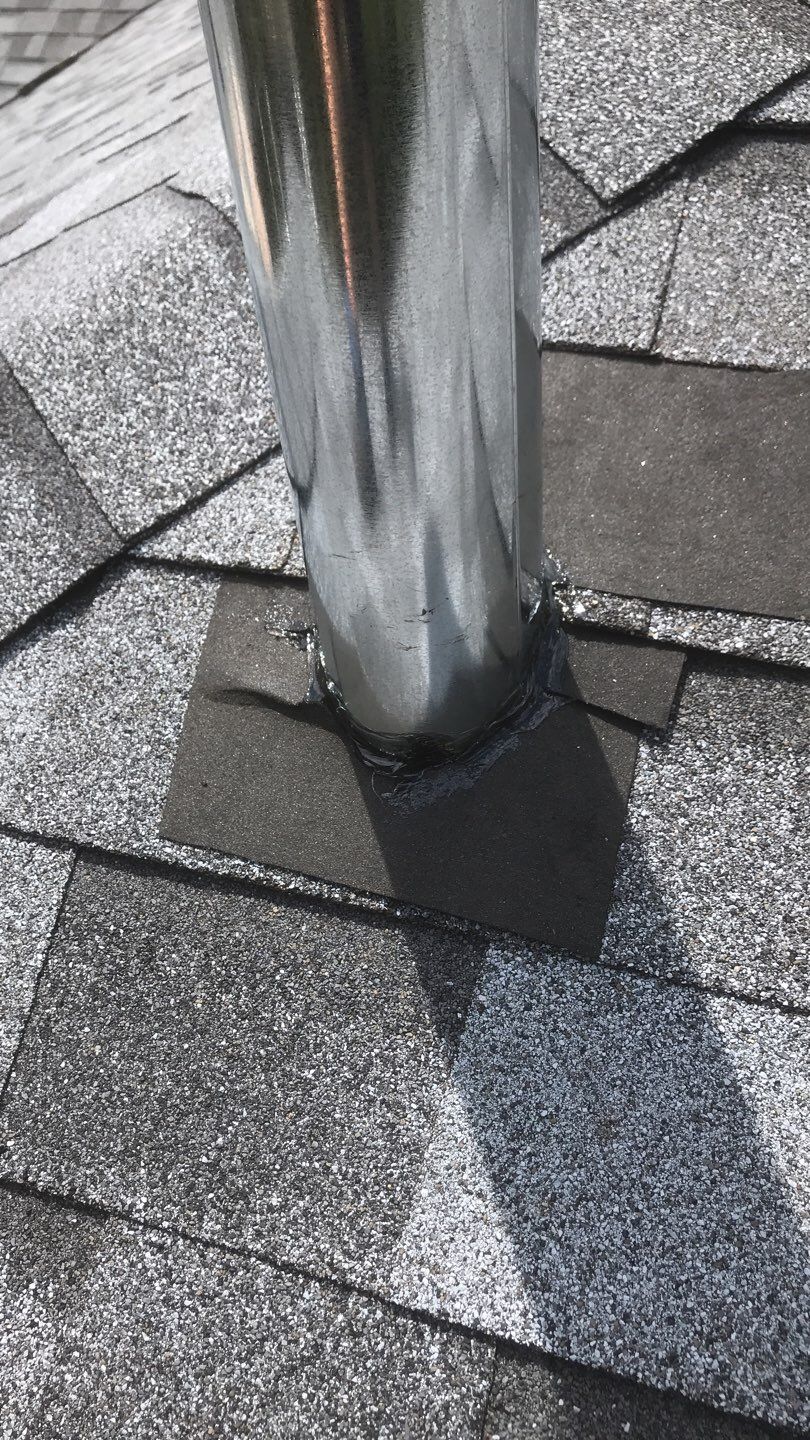 Commercial Roofing Installation using EPDM with white gutters by A Plus Exterior