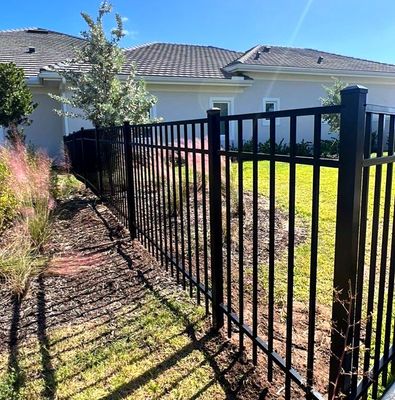 Aluminum Fence Installation using Black 3 Rail Aluminum Fence