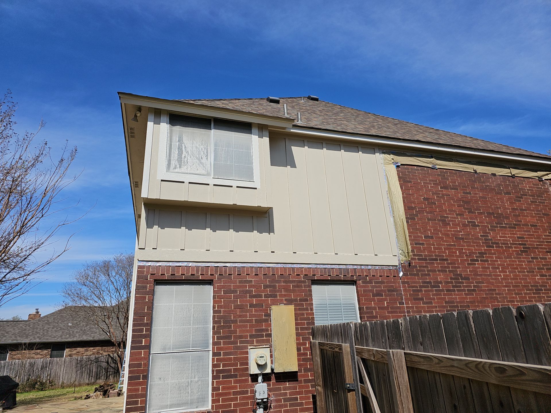 New Hardie Lap Siding & Board and Batten by DeZign Roofing & Exteriors