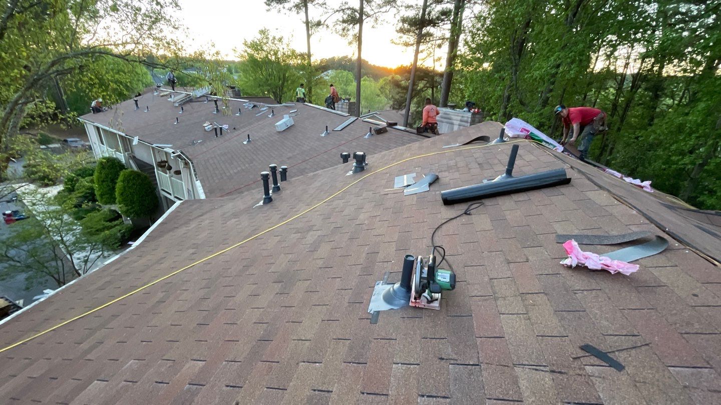 Commercial Roofing Installation using Owens Corning Autumn Brown by Inspector Roofing and Restoration