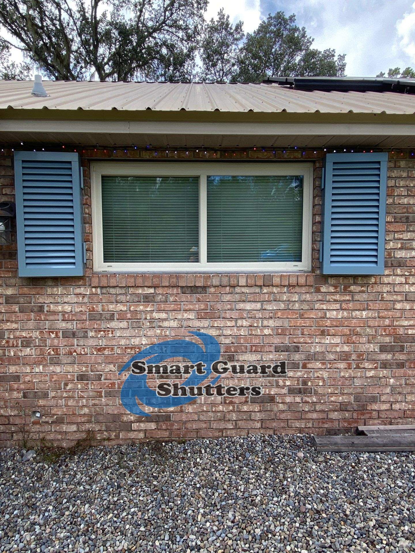 Impact Colonial Shutters in Squirrel Grey by Smart Guard Shutters