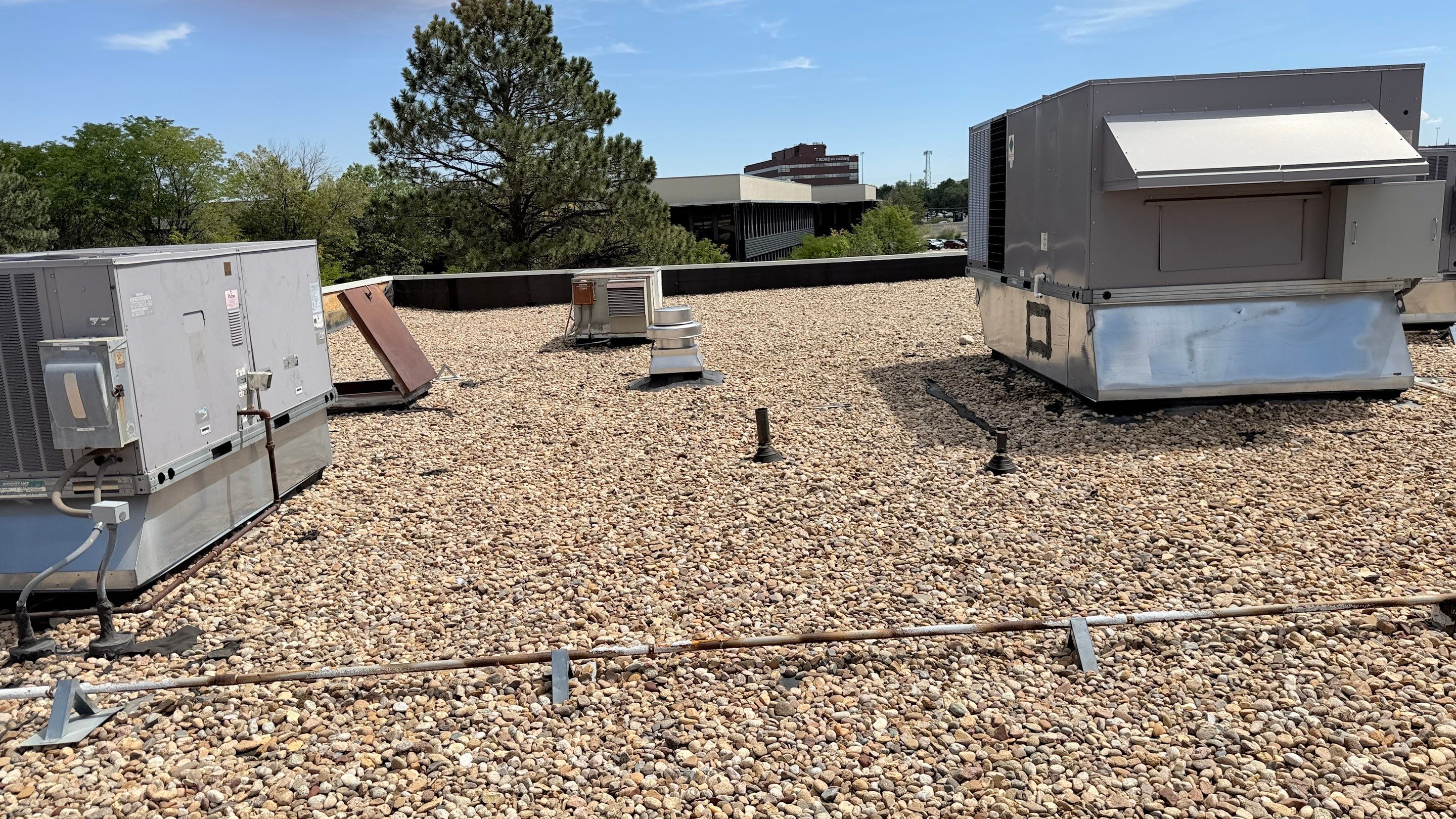 EPDM Commercial Roof Repair and Ballast Maintenance in Centennial by Rhino Roofing LLC