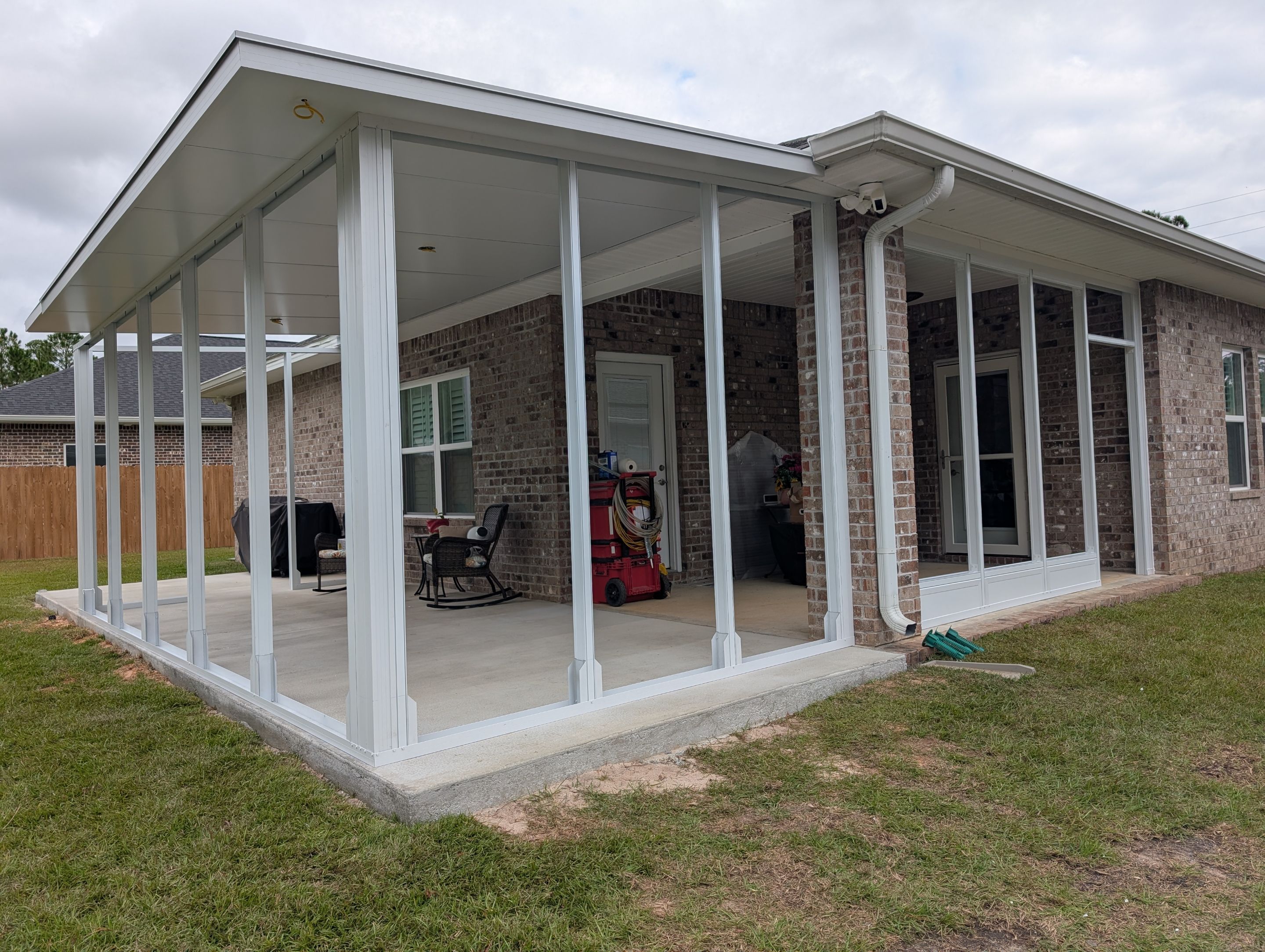 Home addition w/Vinyl 4-Track Windows by Titan Sunrooms