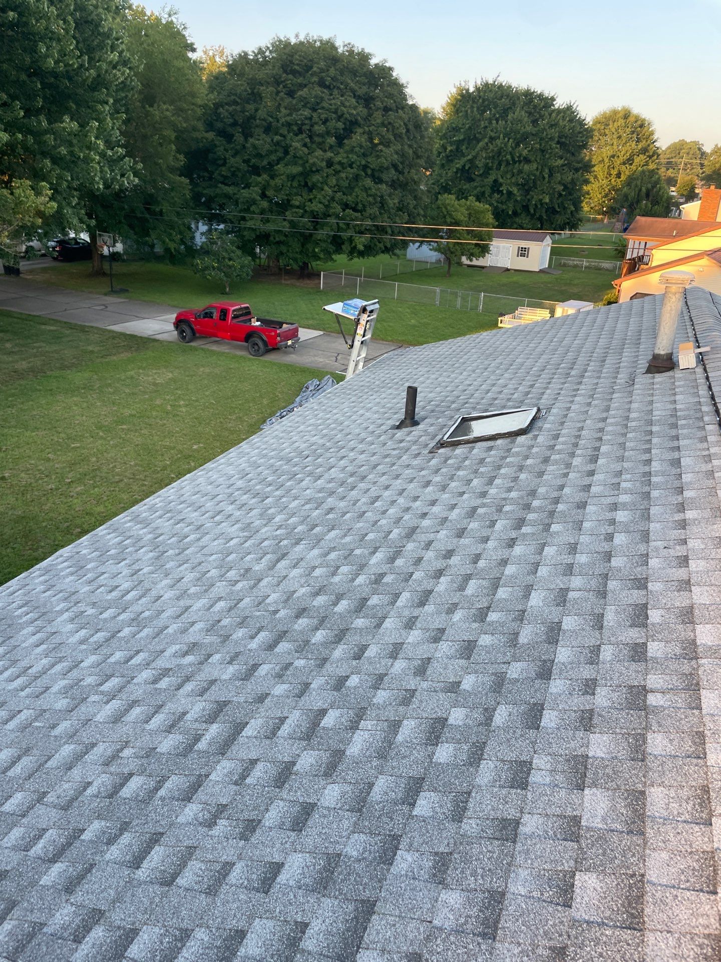 Residential Roofing Installation using GAF Timberline HDZ Oyster Grey by Rainstoppers Roofing