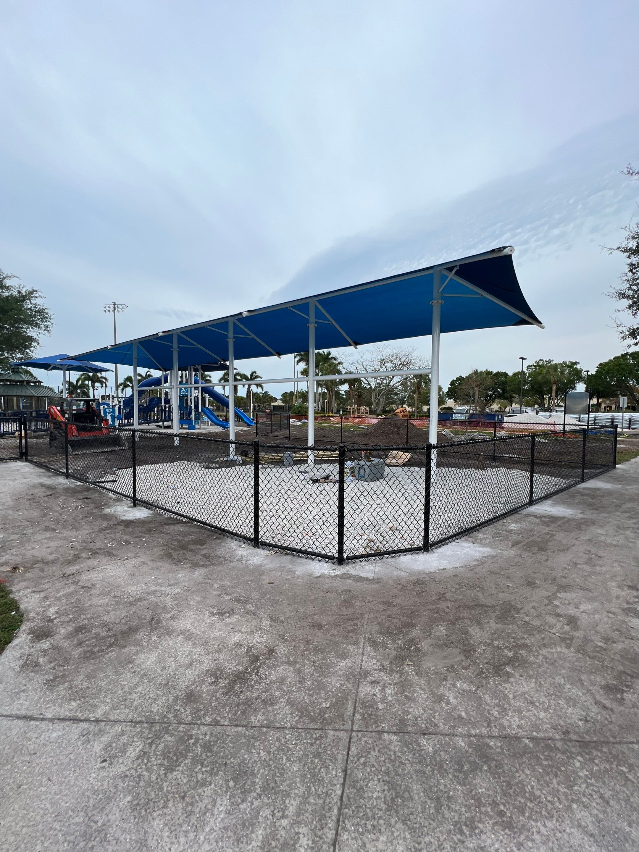 Vinyl Coated Chain-link fence for the City of Naples around Fleischmann Park Playground.  by Asap fence and gates, LLC