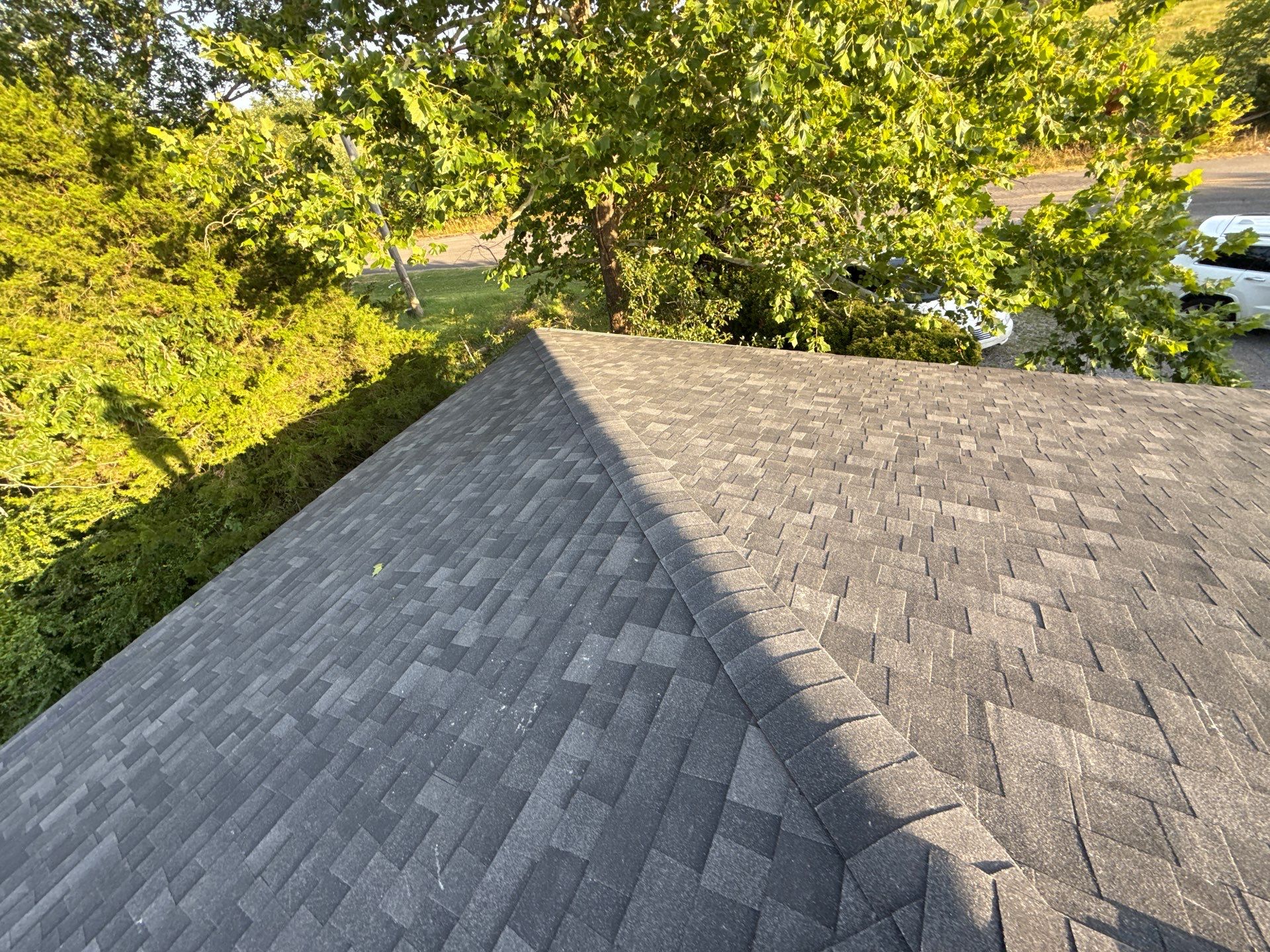 2 layers tear off & installation of new architectural shingles. by In & Out Construction & Remodeling, LLC