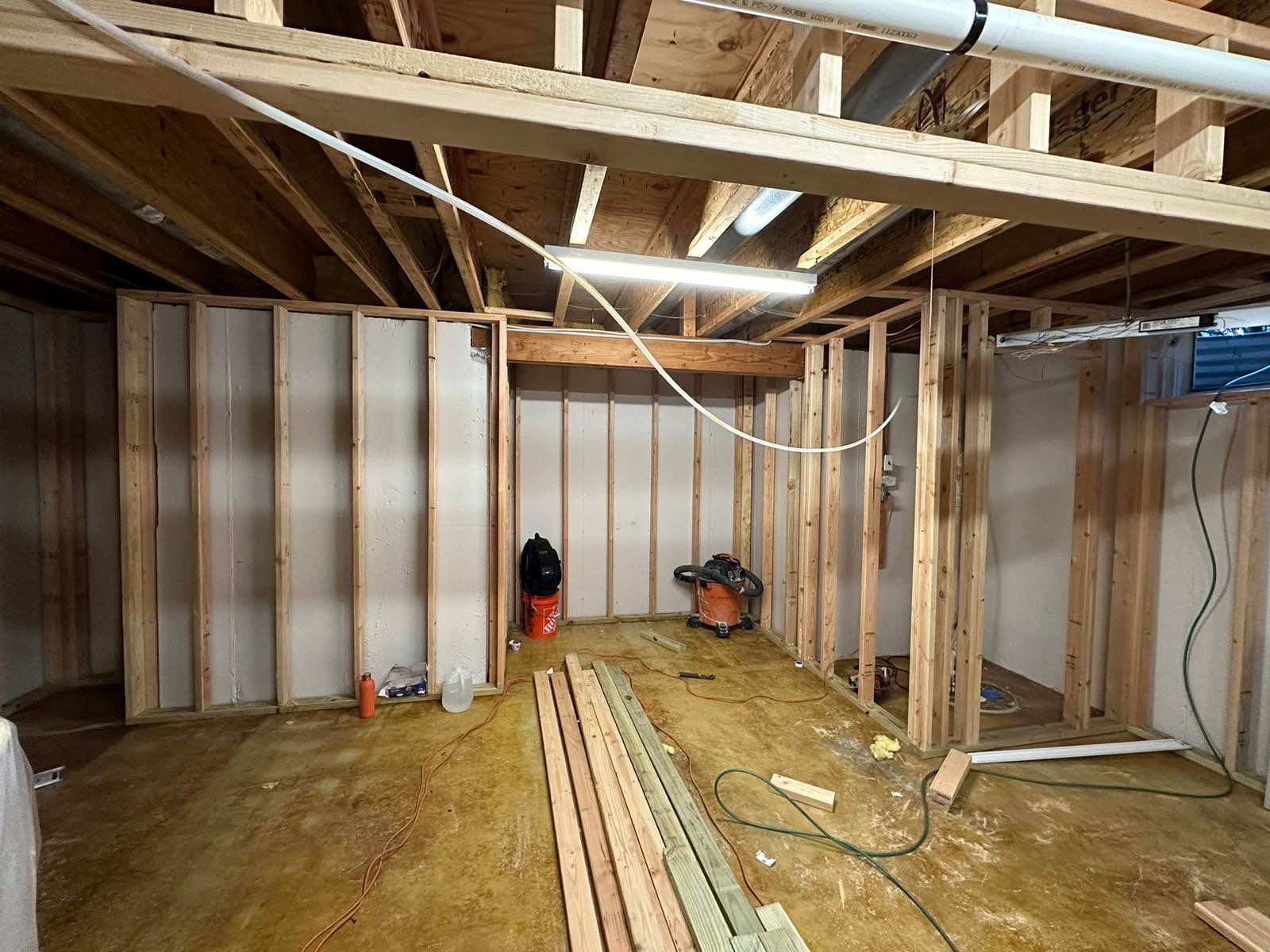 Basement Remodel using Wood by Home Concepts Construction