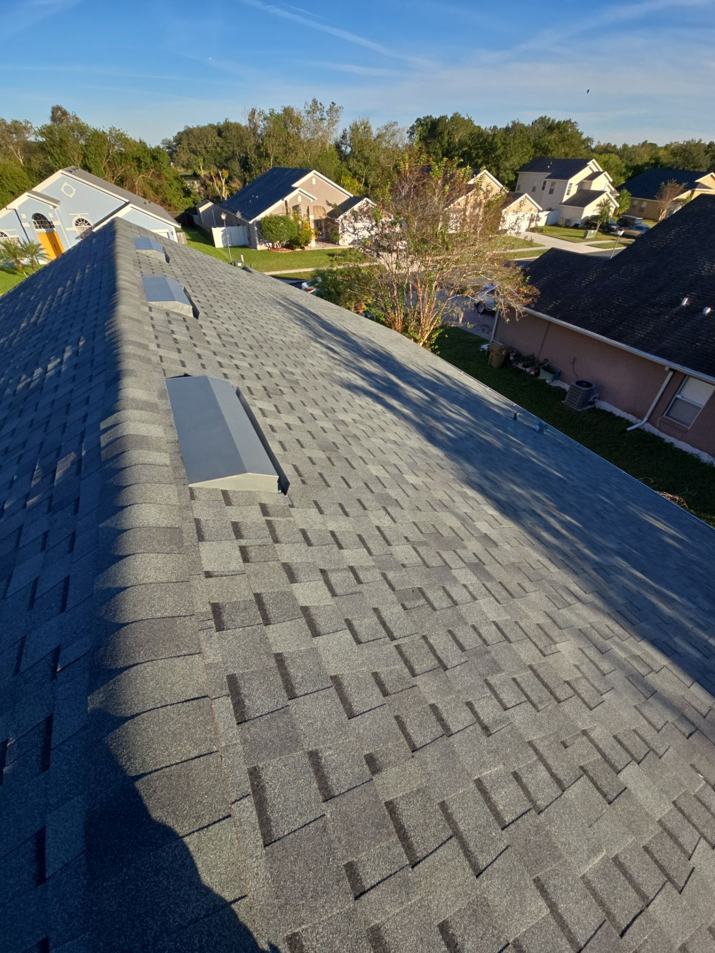 Atlas Pinnacle Pristine Architectural Shingle Roof Replacement in Kissimmee by Fortified Roofing Solutions Corp.