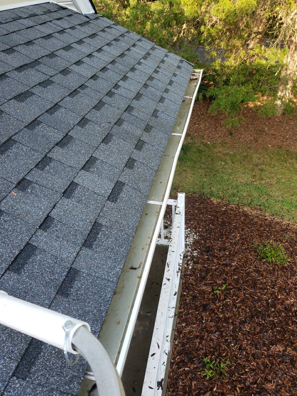 Gutter Cleaning using water by G&H Home Tech Pros LLC