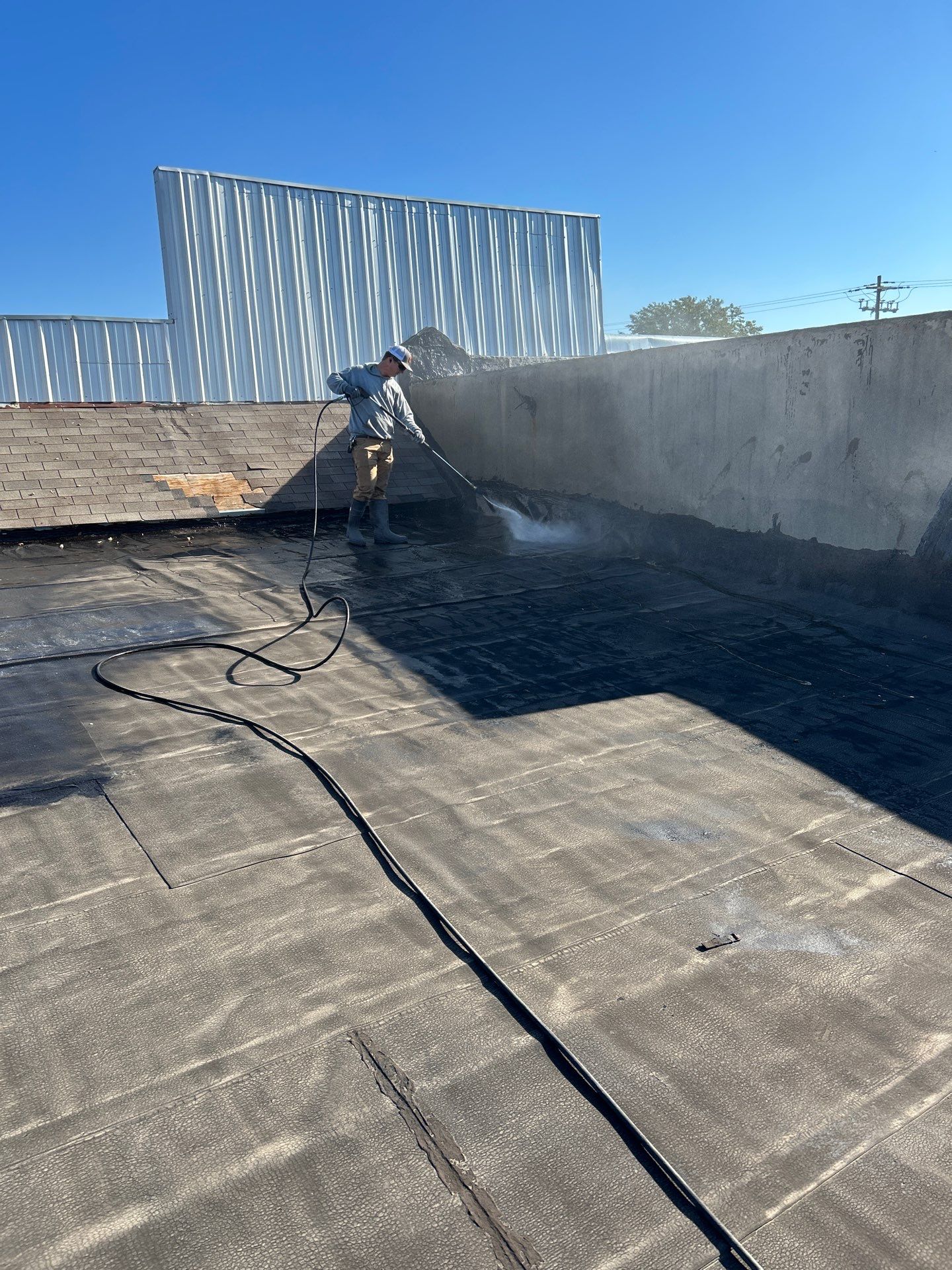 Downtown Gladewater Commercial Foam Roof Restoration – SPF + High-Tensile Acrylic by All Star Roofing LLC