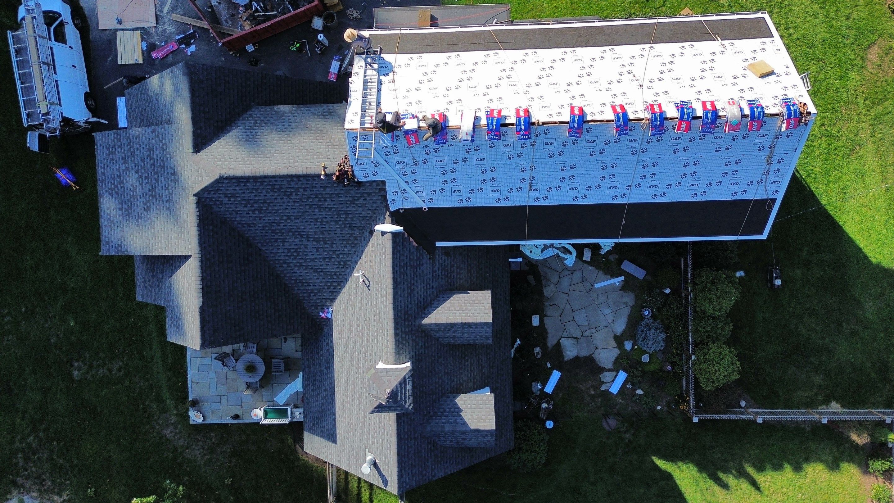 Roof Replacement & Chimney Removal – Westford, MA by Mighty Dog Roofing of Greater Middlesex County