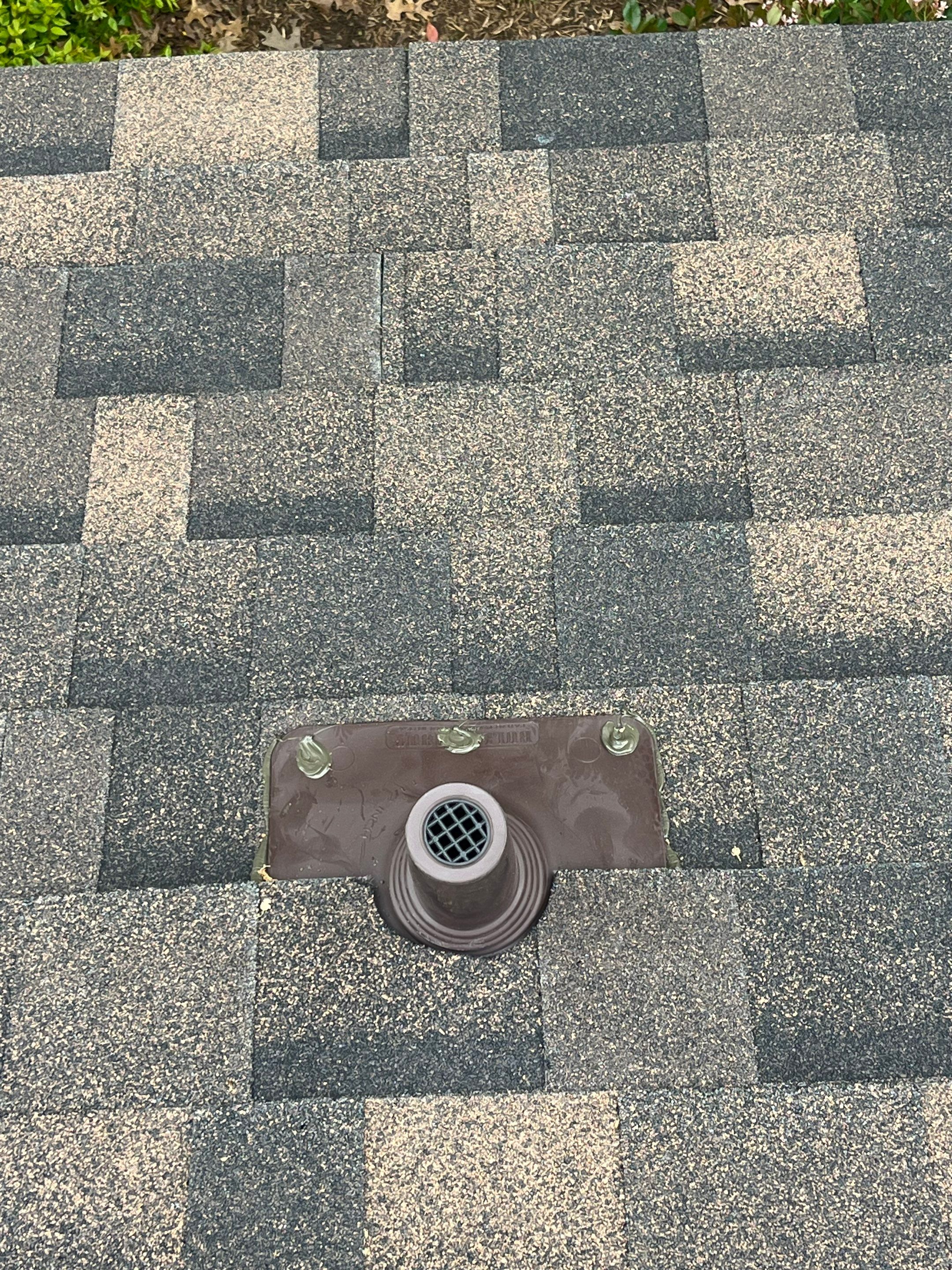 Brown brick with IKO Shadow Brown by Tejas Roofworks + Restoration