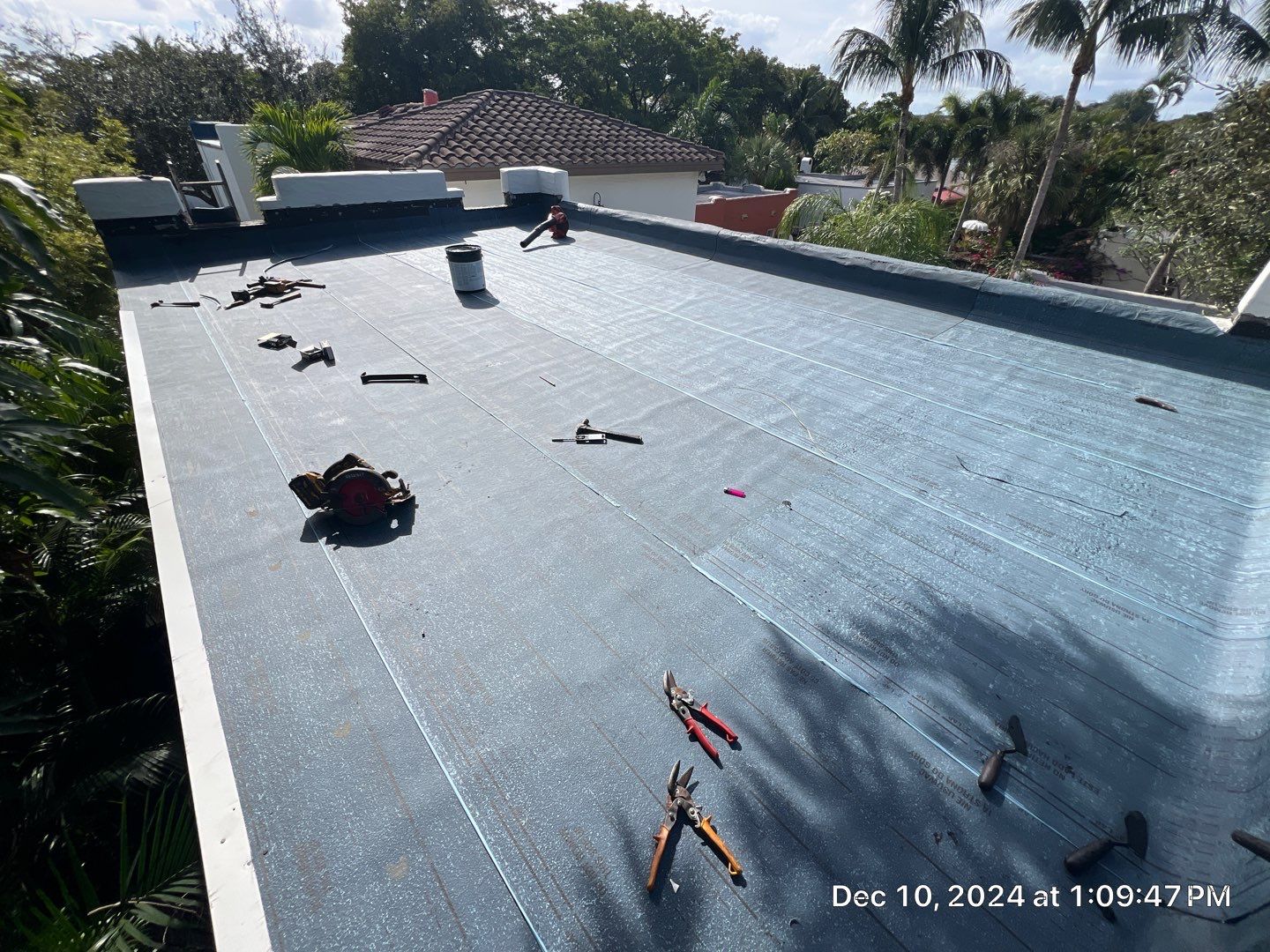 West Palm Beach Roof Restoration and Travertine Paver Driveway Installation by Aastro Roofing
