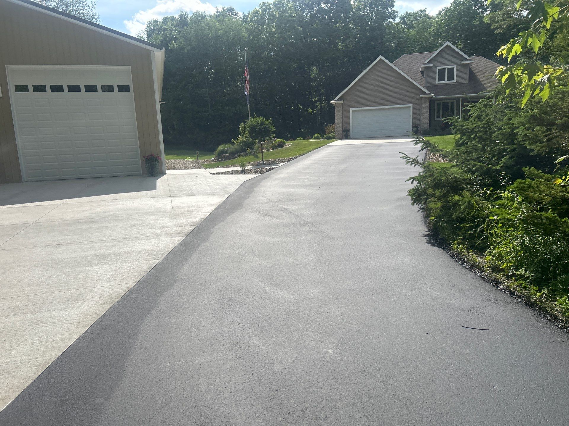 High end residential driveway by Quality Asphalt & Maintenance LLC
