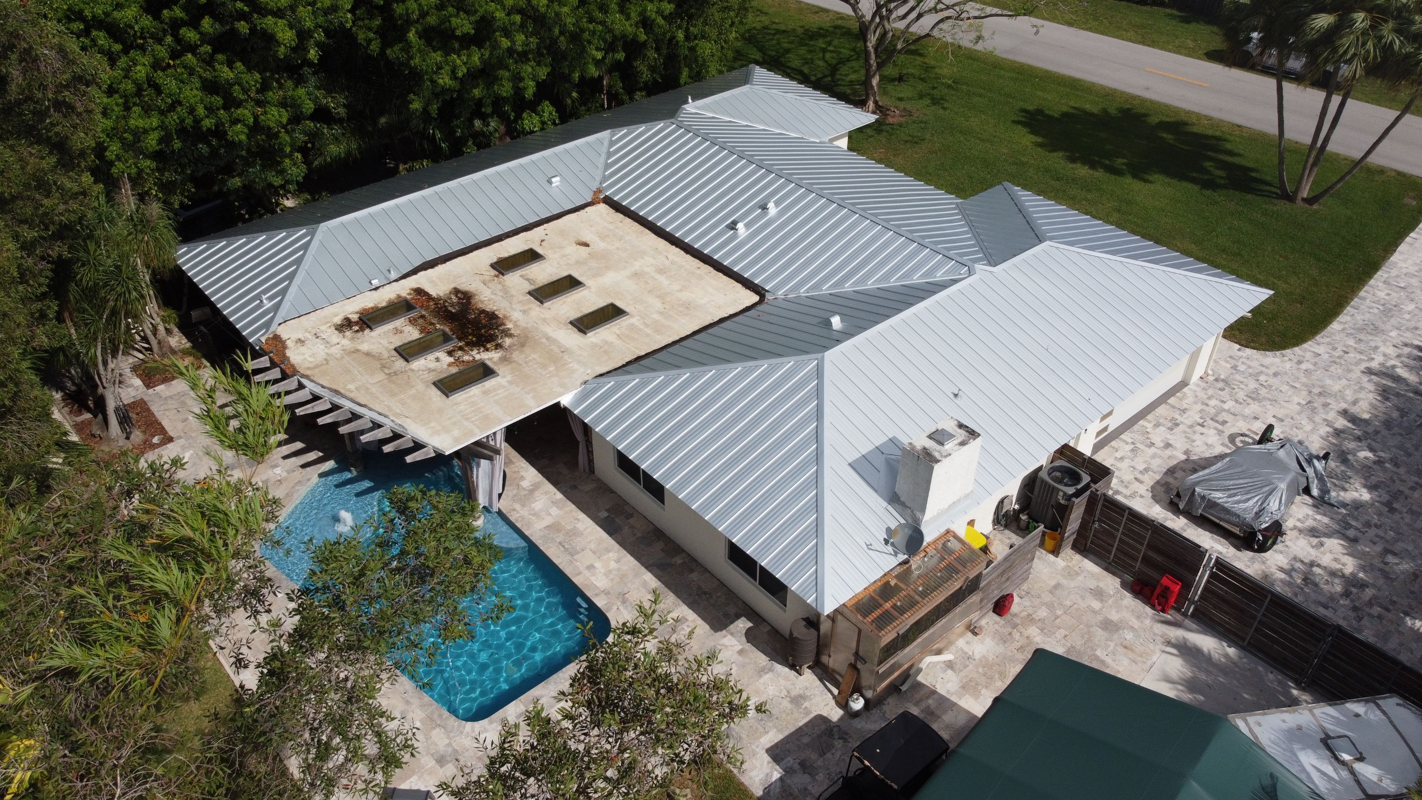 Residential Roofing Installation using 1" Nail strip metal roof by BLUES BROTHERS ROOFING