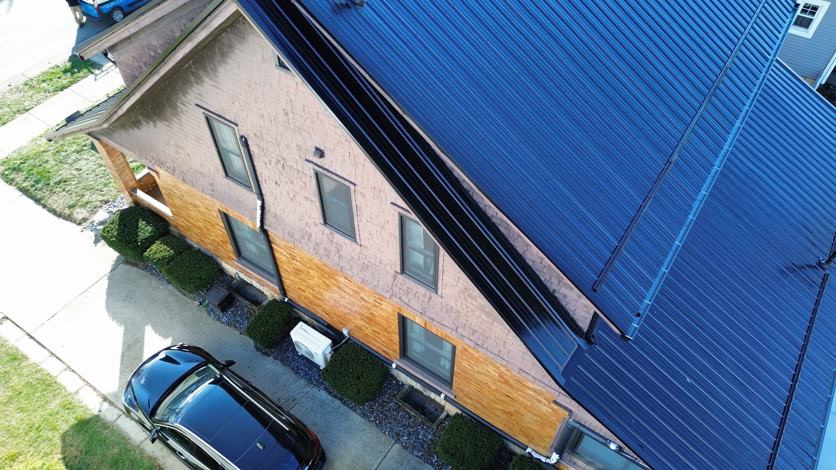 Residential Roofing Installation using Perfromance Panel Metal - Black by RoofX 