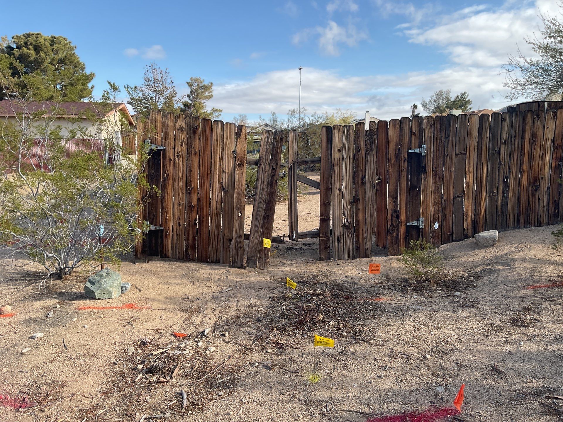 Gate installation using Wood by Fence Guys Inc. 