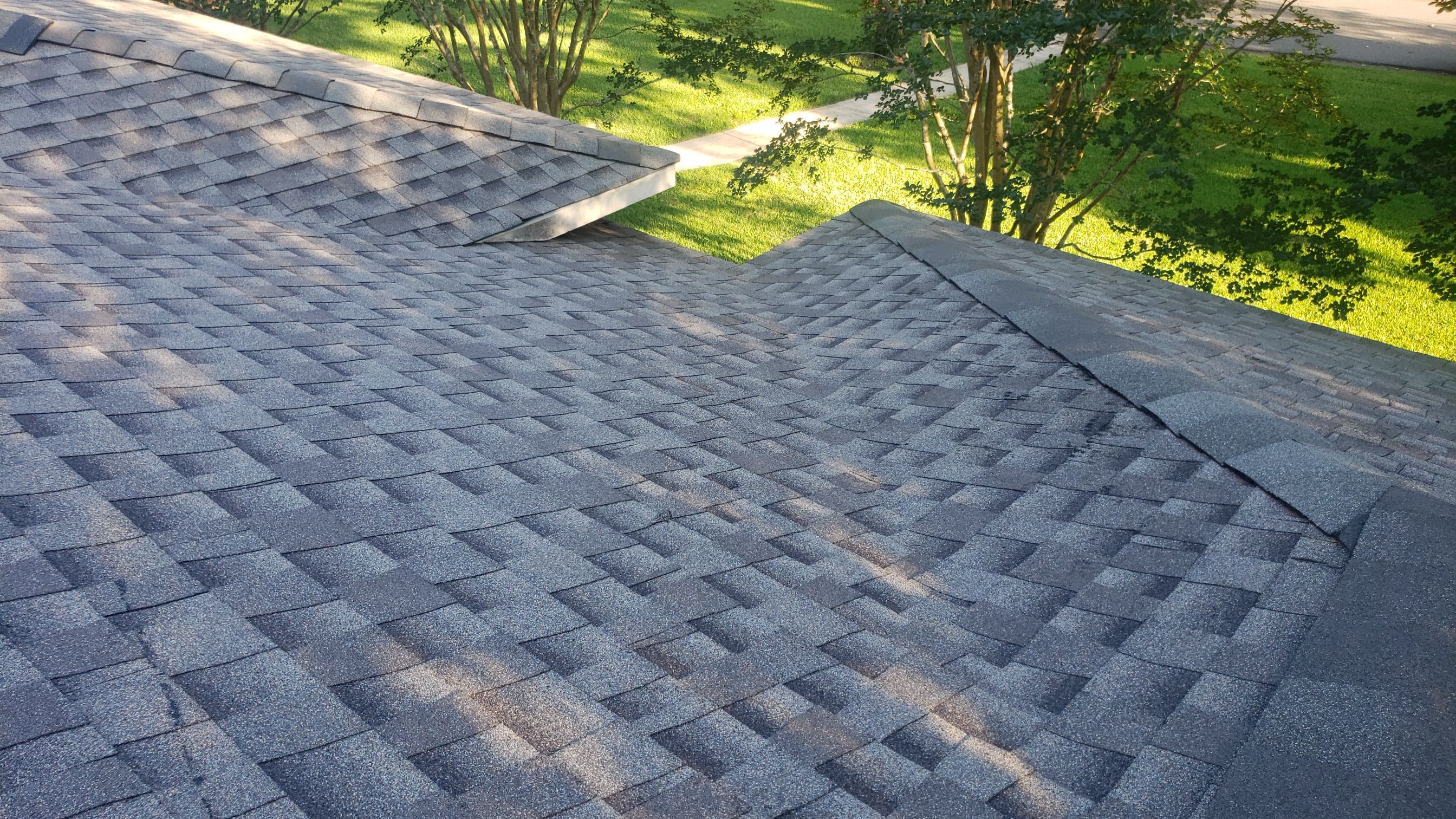 Residential Roofing Installation using Roof Replacement by American Roofing & Construction LLC
