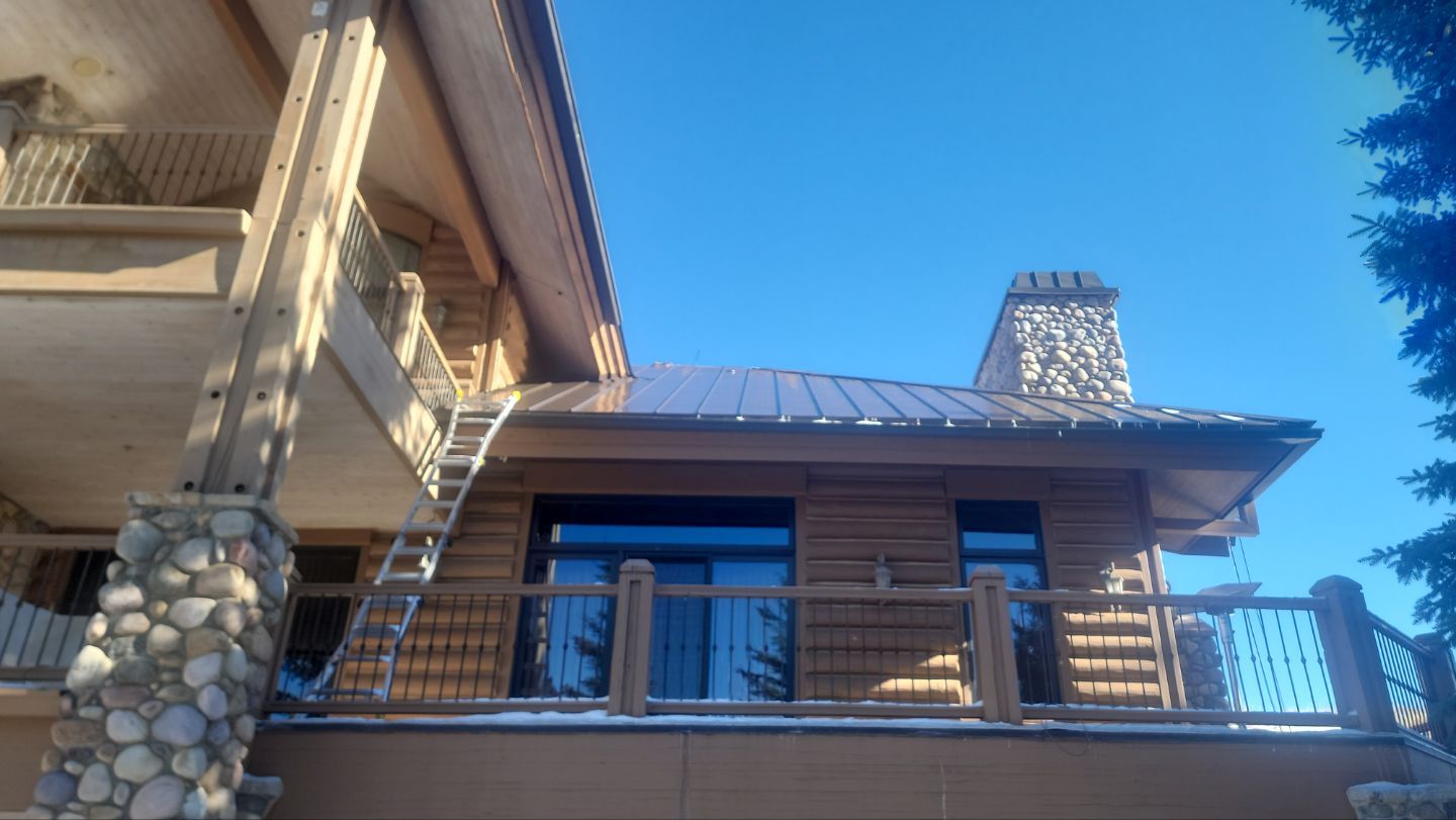 Standing Seam Metal Roof Replacement After Snow Damage by ASAP Roofing & Restoration