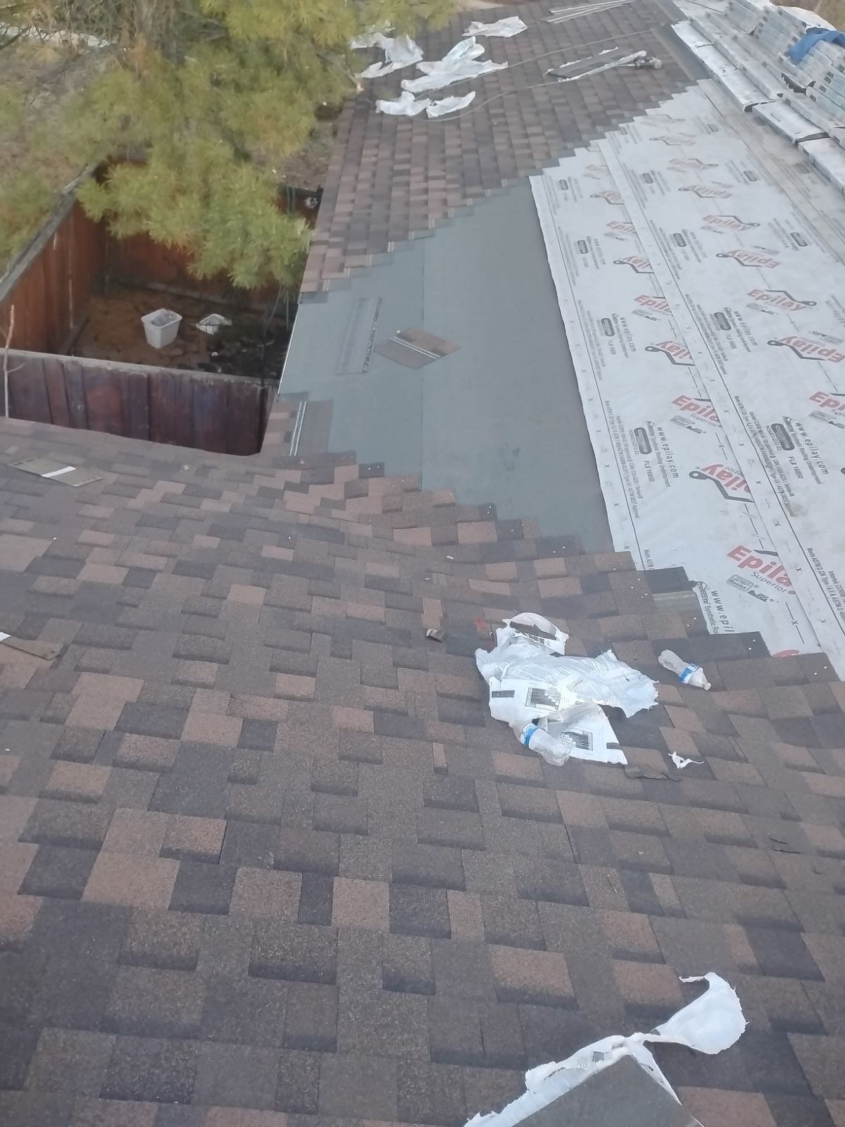 Onyx Black Shingles by Reimagine Roofing