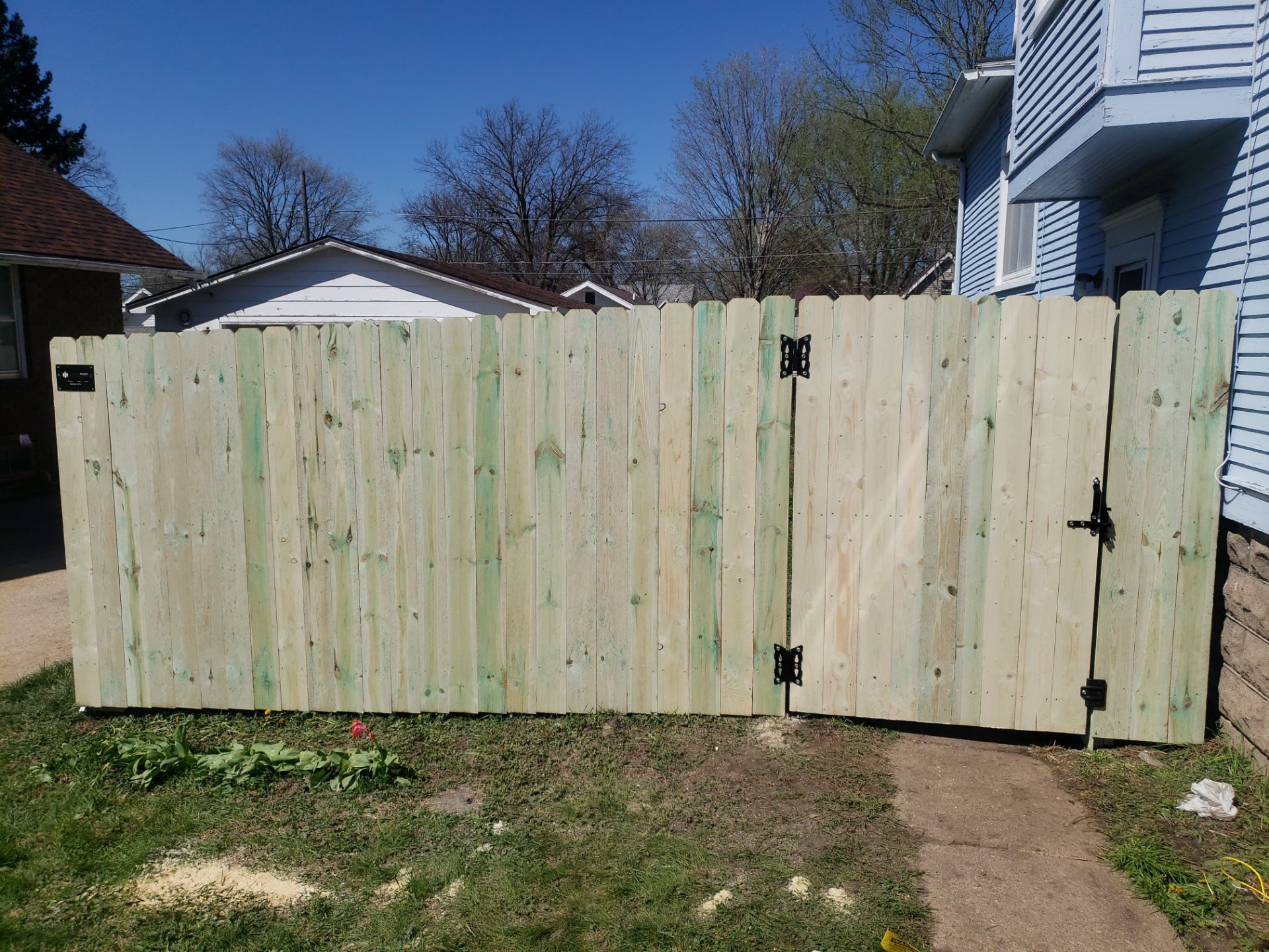 Pressure-Treated Wood Privacy Fence Replacement in Waterloo by Perfect Picket Fence and Stain