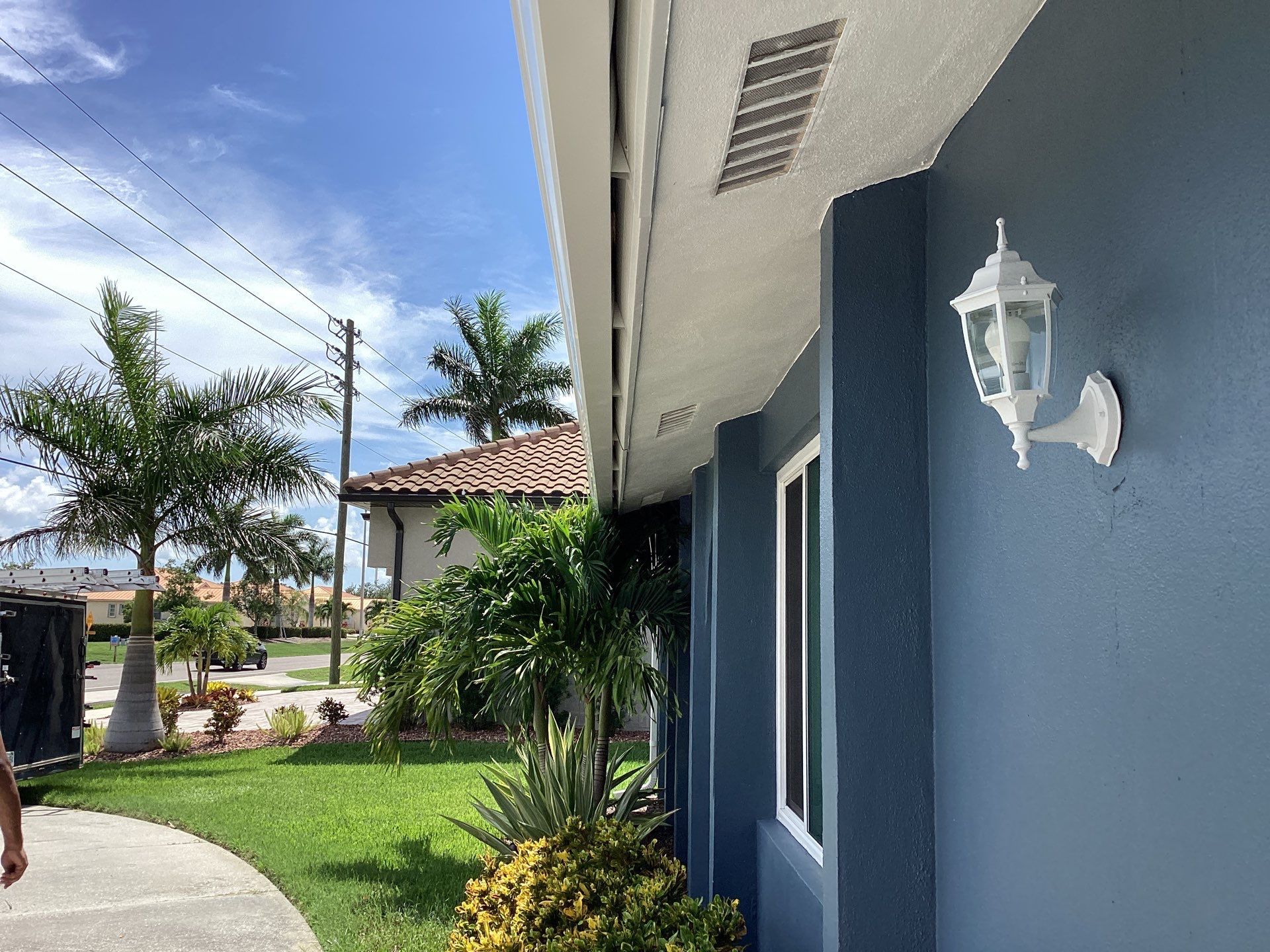 White Downspouts and Gutters Combo in Punta Gorda FL by Gutter Professors