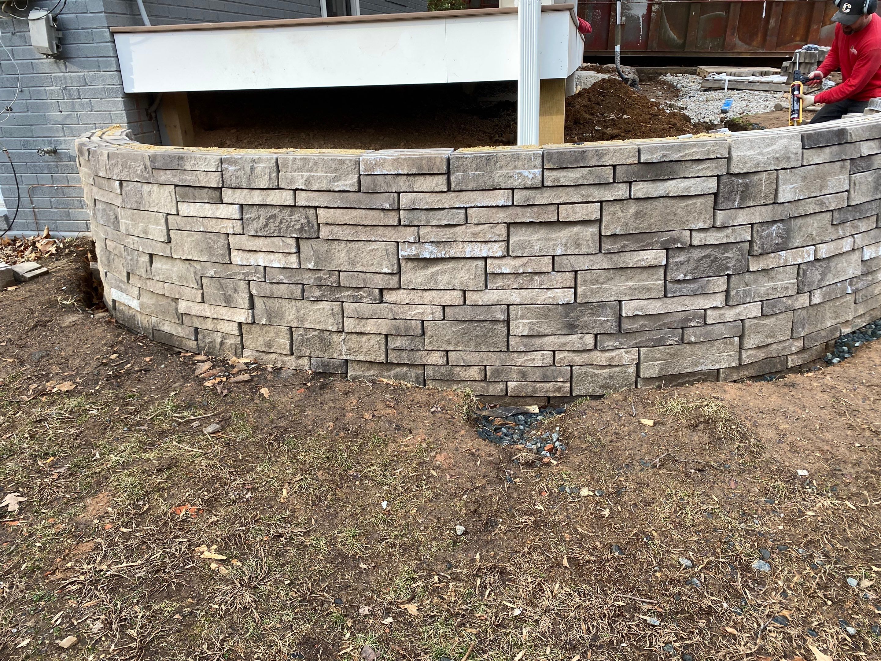 Retaining wall, walkway, small patio and landscape install by The Smet Companies, LLC