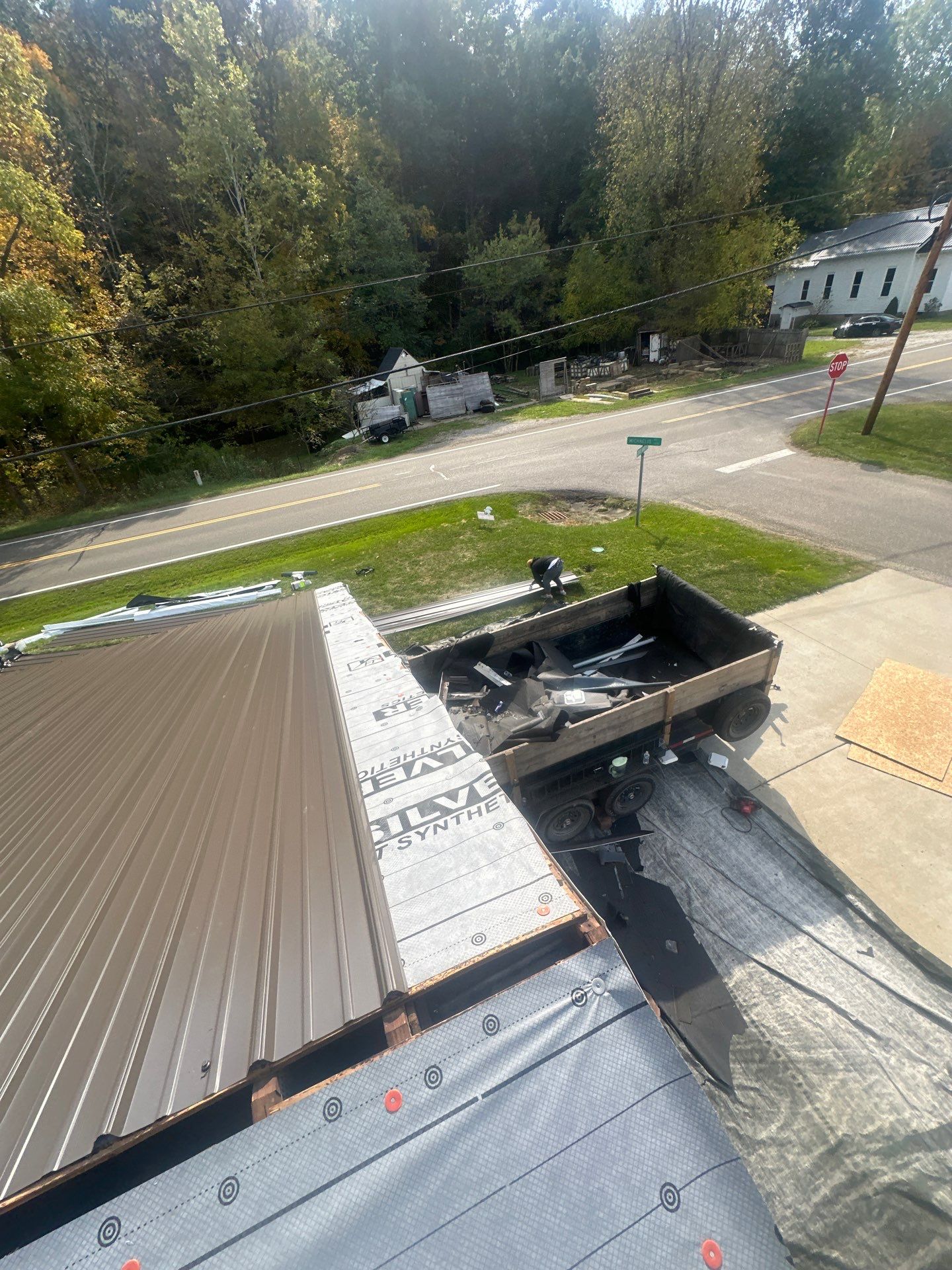 Residential Roofing Installation using Metal by Rainstoppers Roofing
