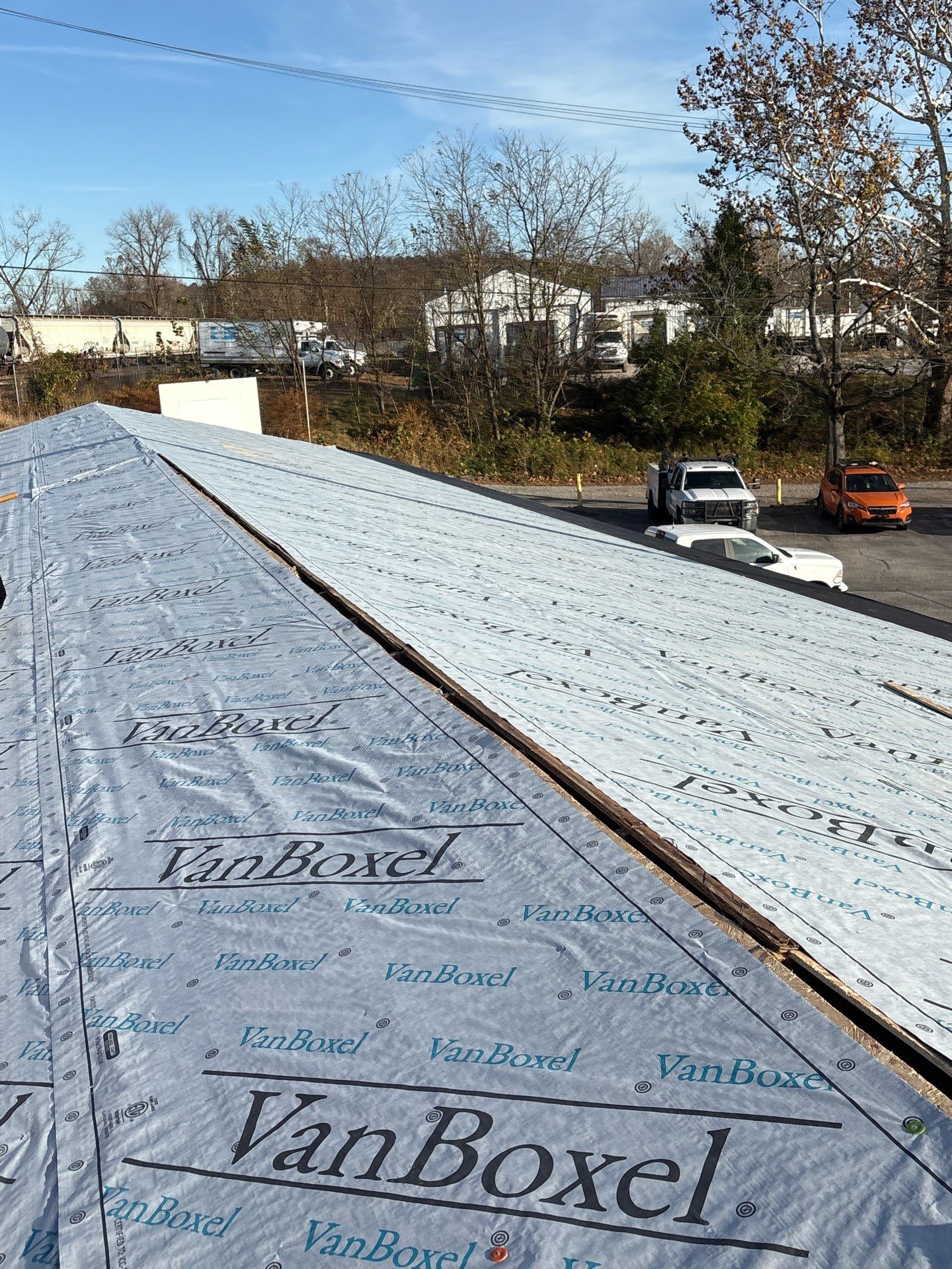 Commercial Roofing Installation using GAF Timberline HDZ Pewter Gray by Rainstoppers Roofing