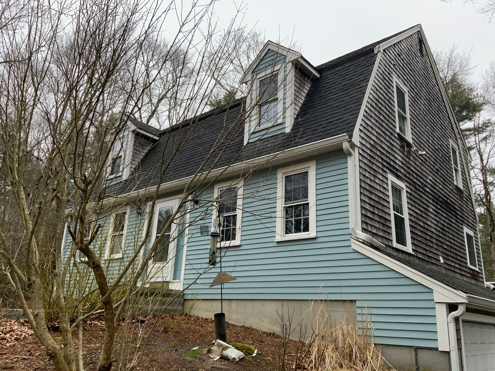 Partial residing project with Red Cedar shingles in Duxbury, MA by UBrothers Construction