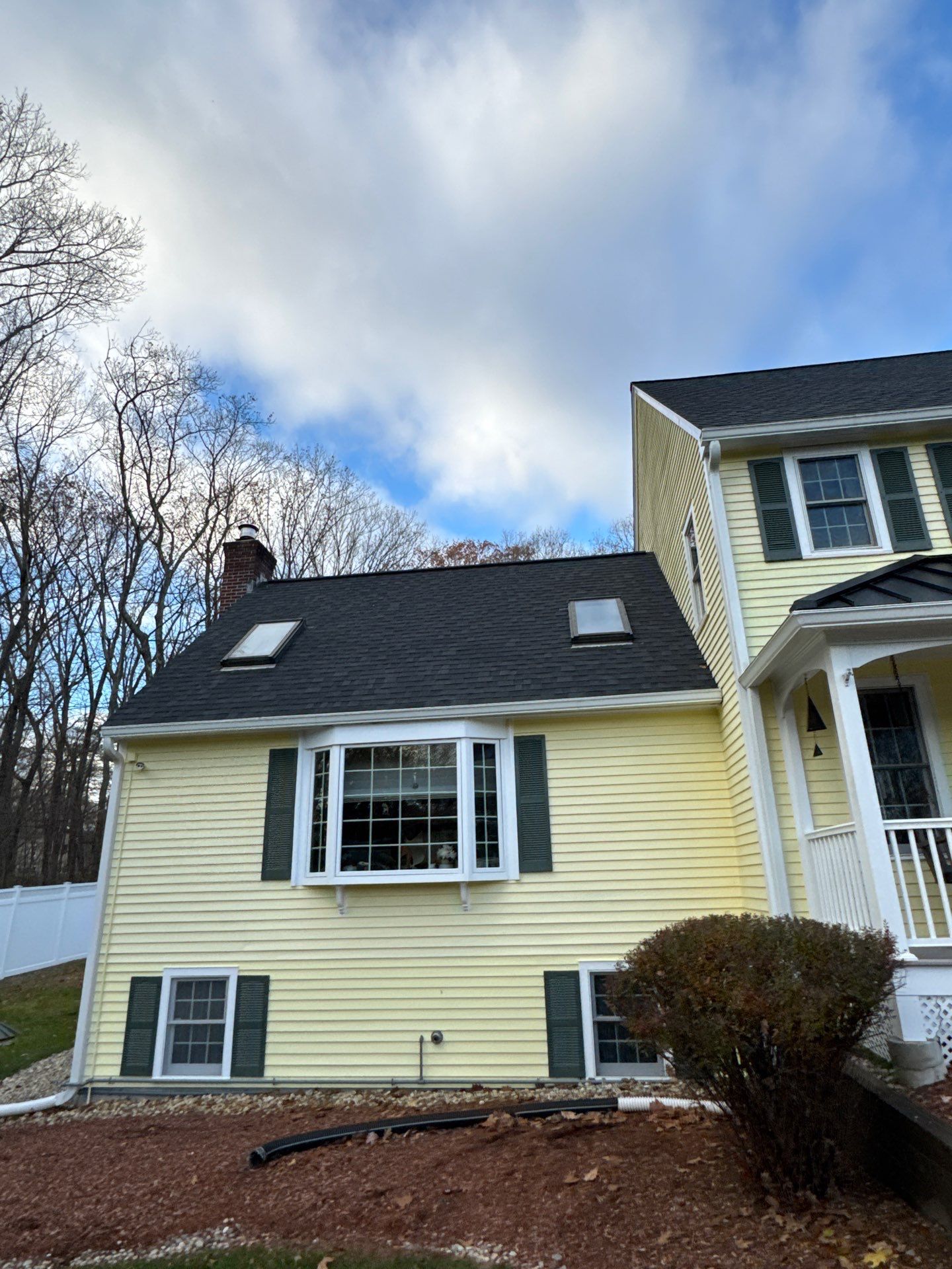Chelmsford Premium Roof: Onyx Black Shingles with Standing Seam Metal Porch by Mighty Dog Roofing of Greater Middlesex County